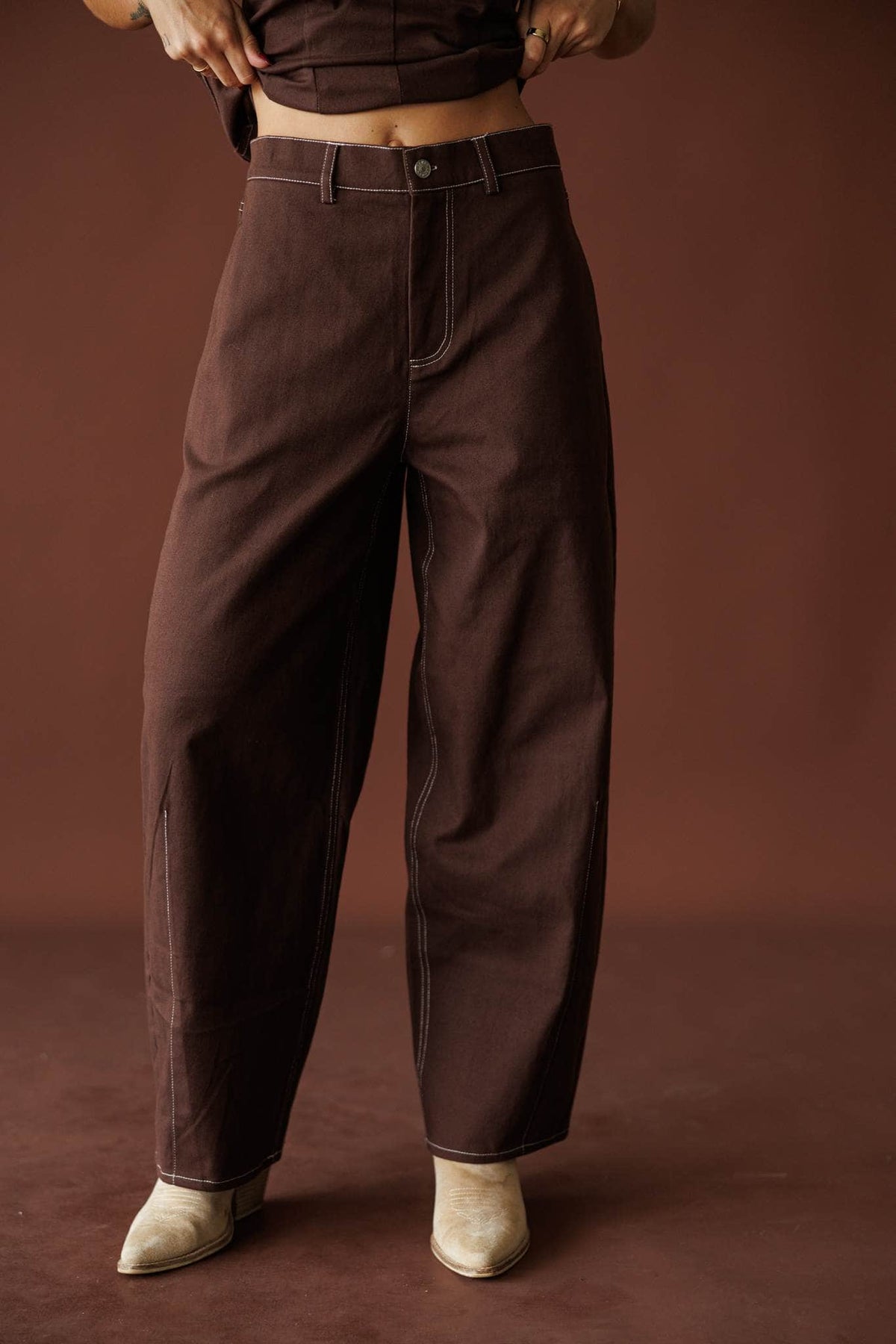 Roadhouse Barrel Pants in brown, front view of the barrel leg with booties