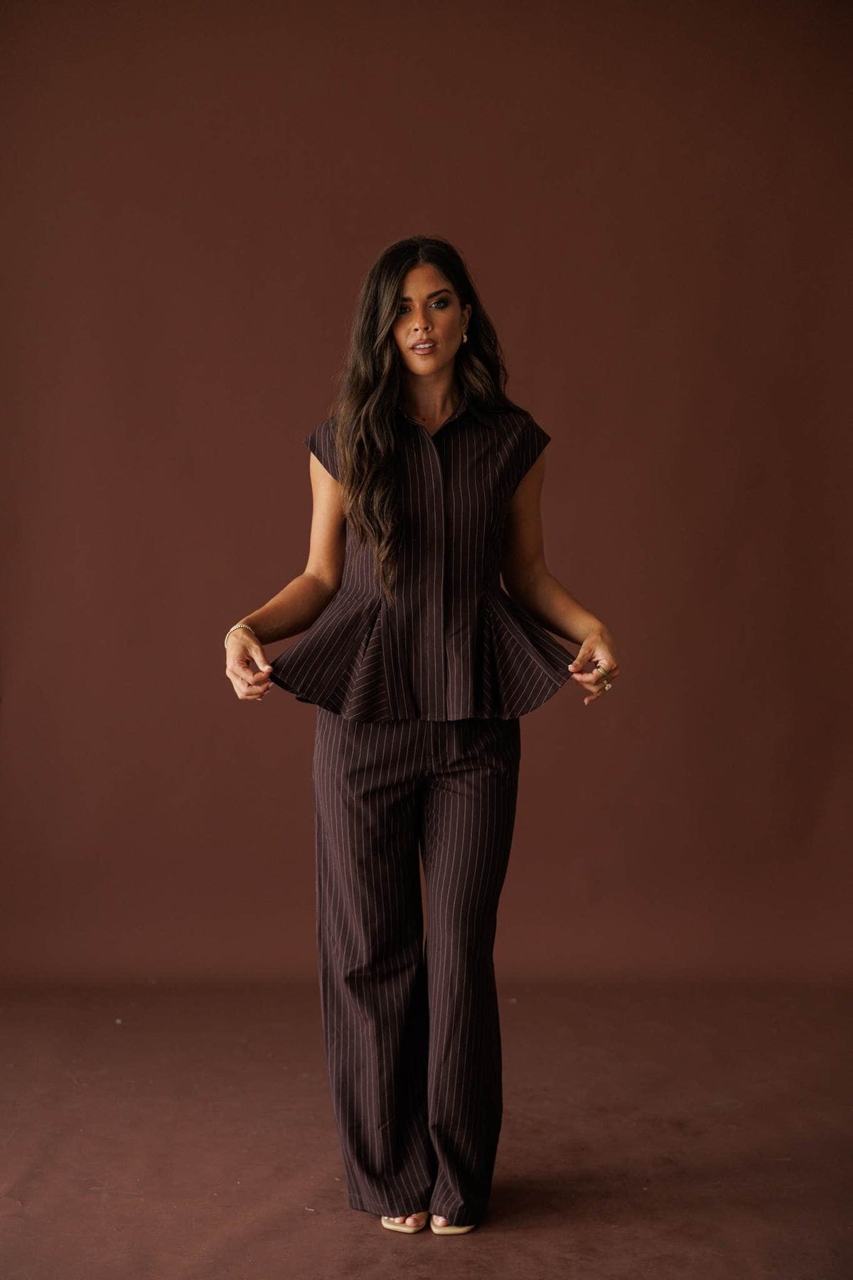 Members Only Top in brown pinstripe, front view of the collared cap-sleeve bodice