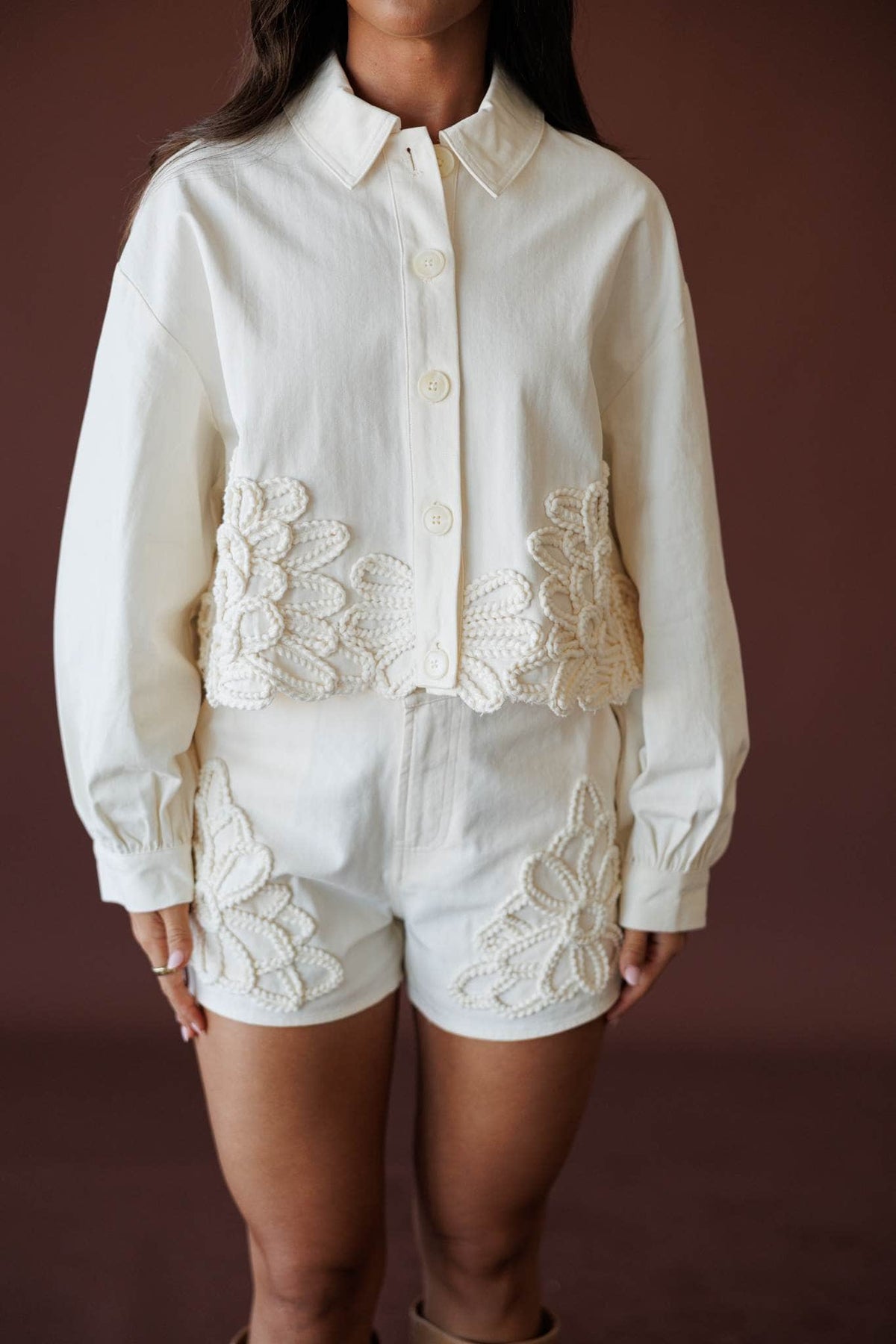Wildflower Utility Jacket, in ecru, front view of the collar and button front