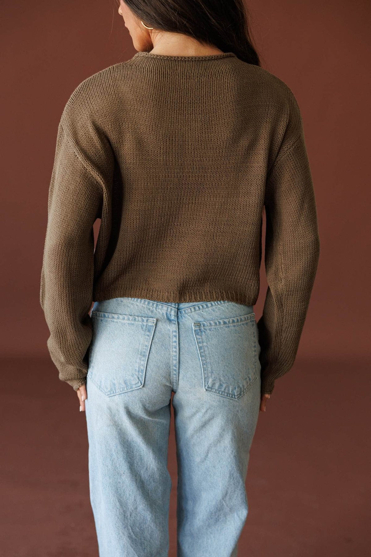 Common Ground Cardigan in olive, back view showing the boxy cropped knit