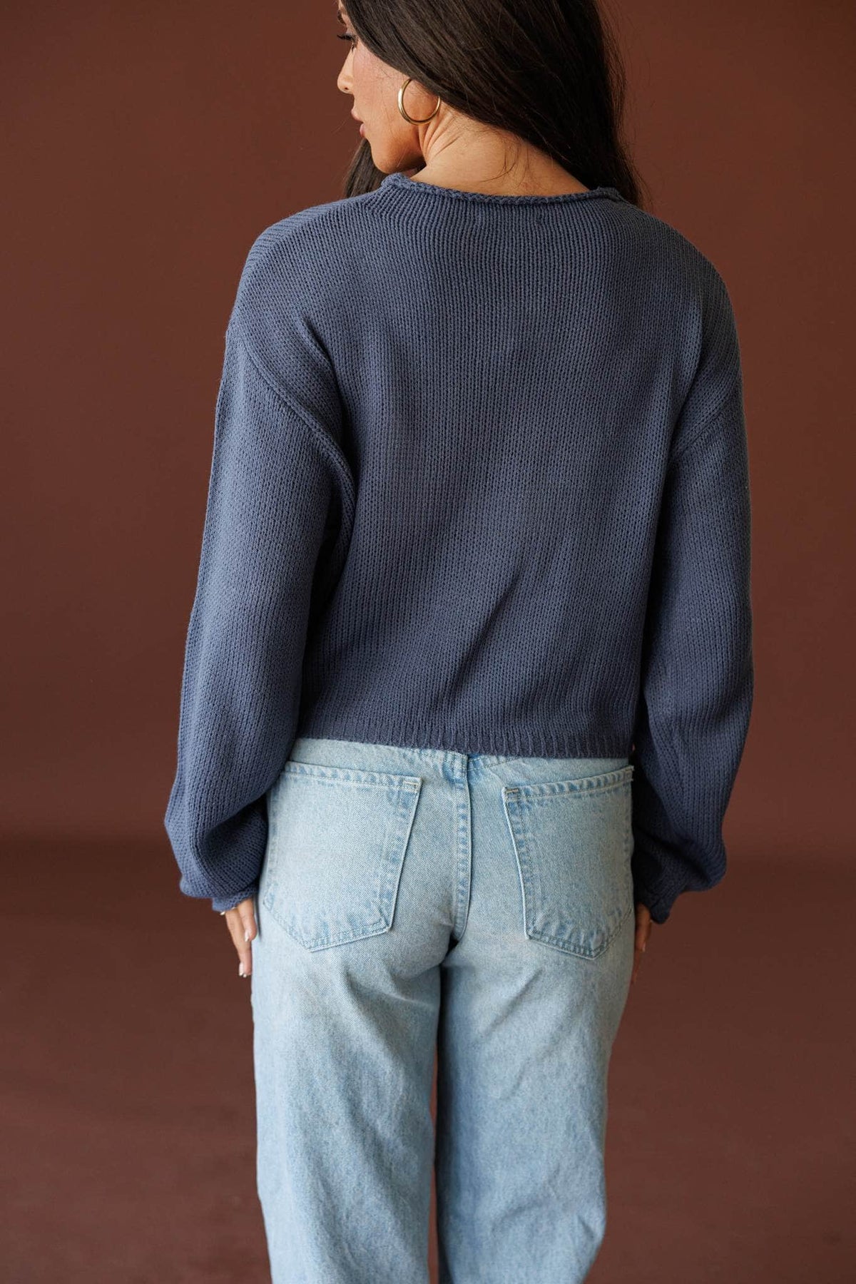 Common Ground Cardigan in nightfall, back view showing the boxy cropped knit