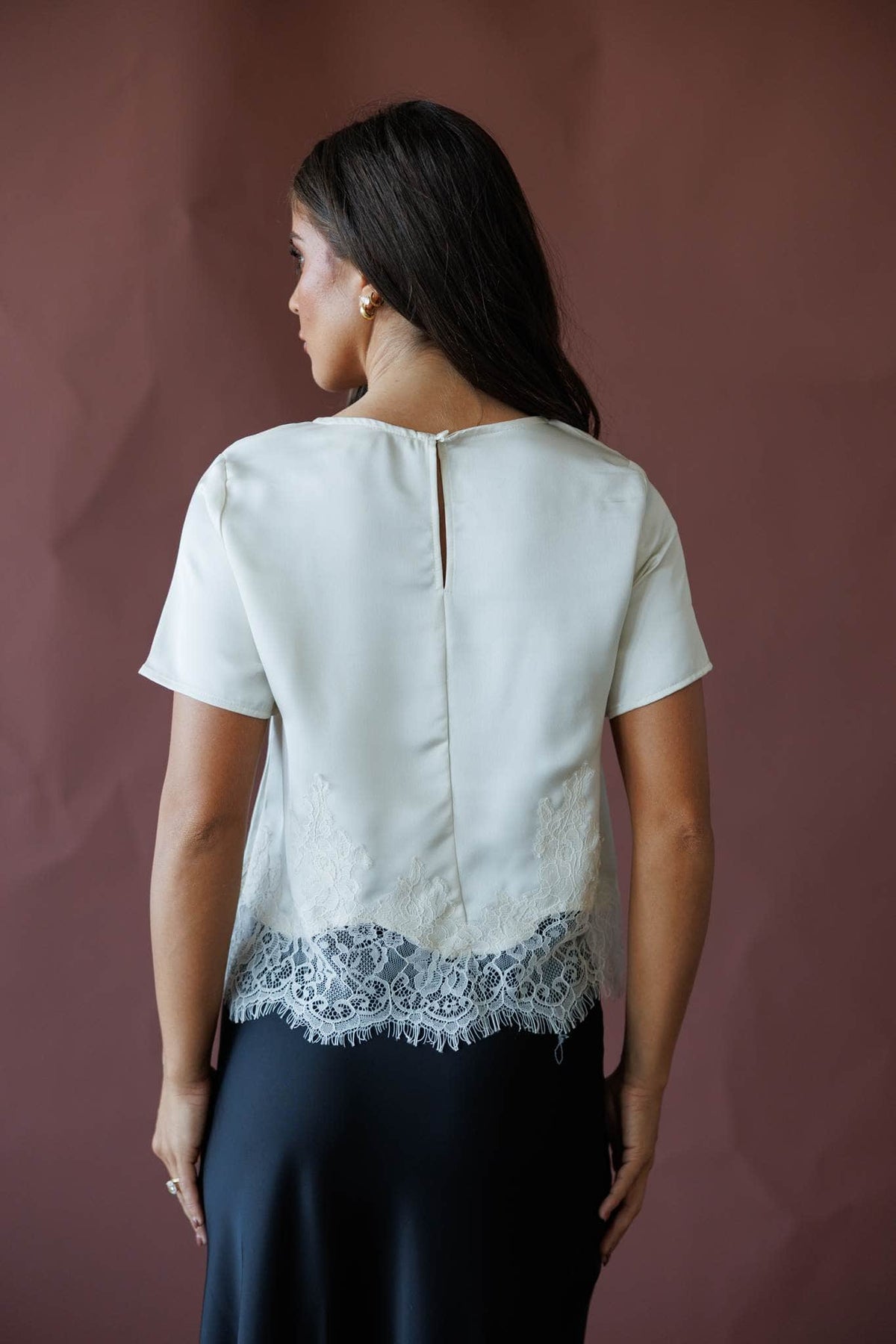 Cream short sleeve top with lace hem