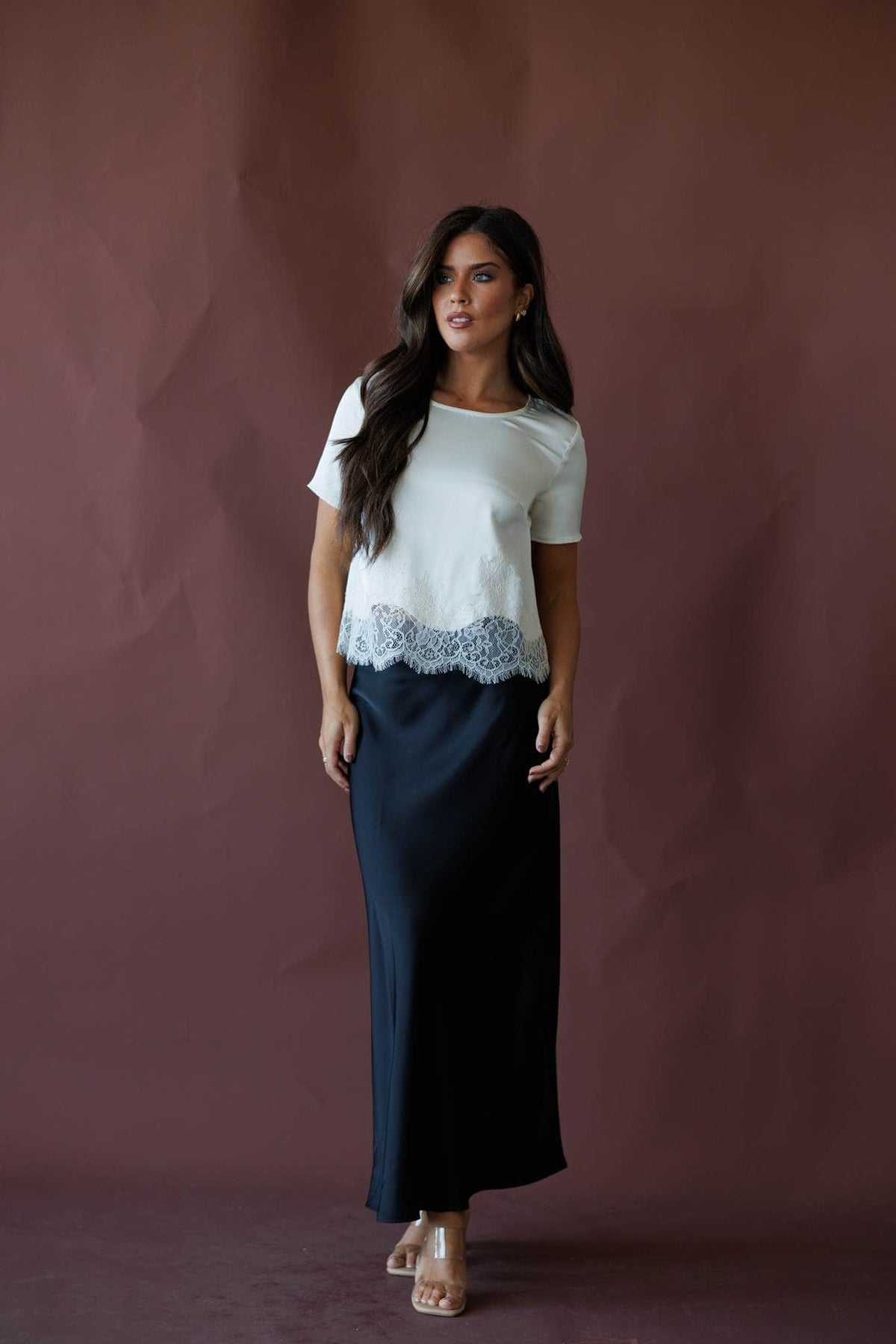 Cream short sleeve top with lace hem, front view