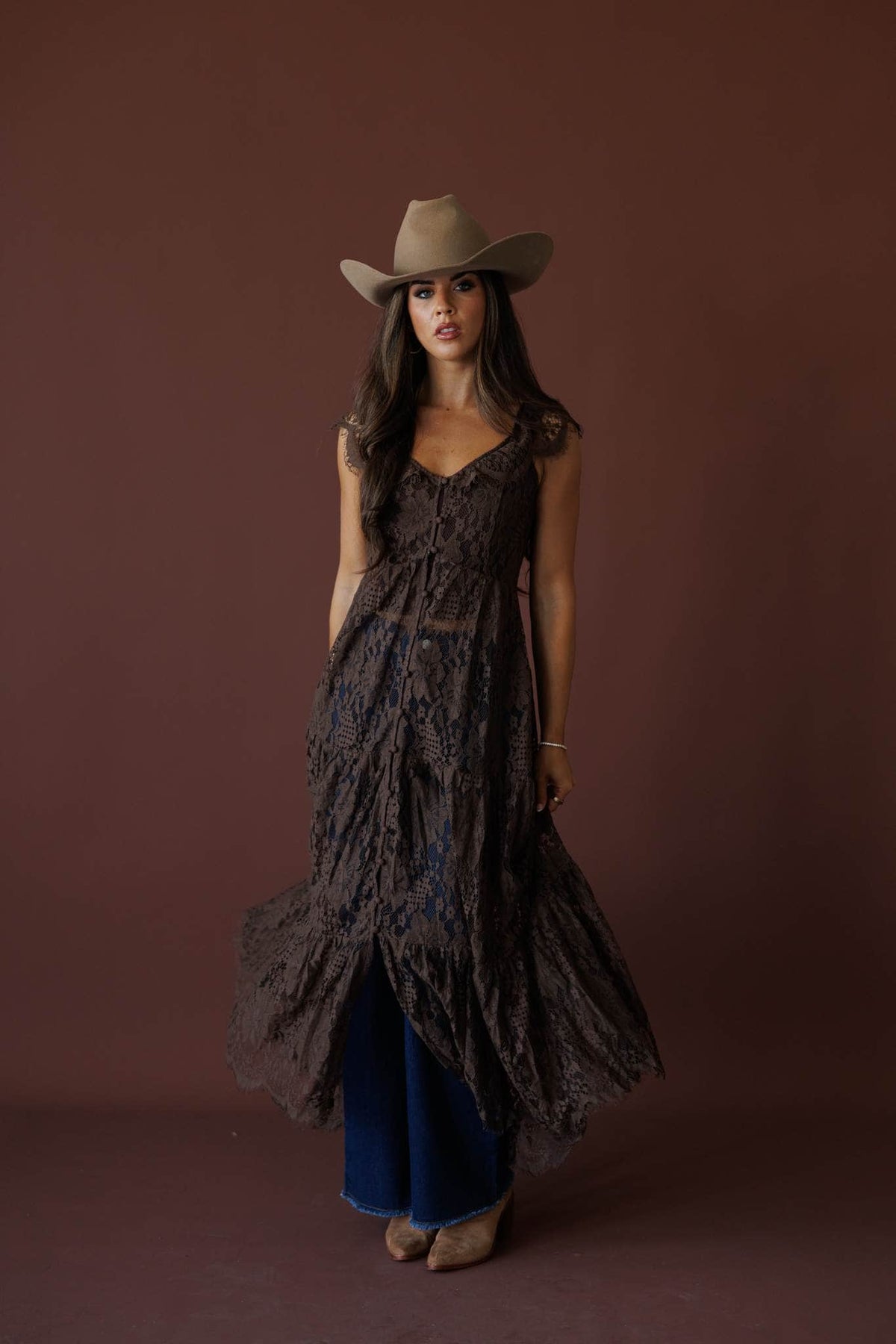 Lace Trail Maxi Top in chocolate, full-length view with a tan hat over jeans
