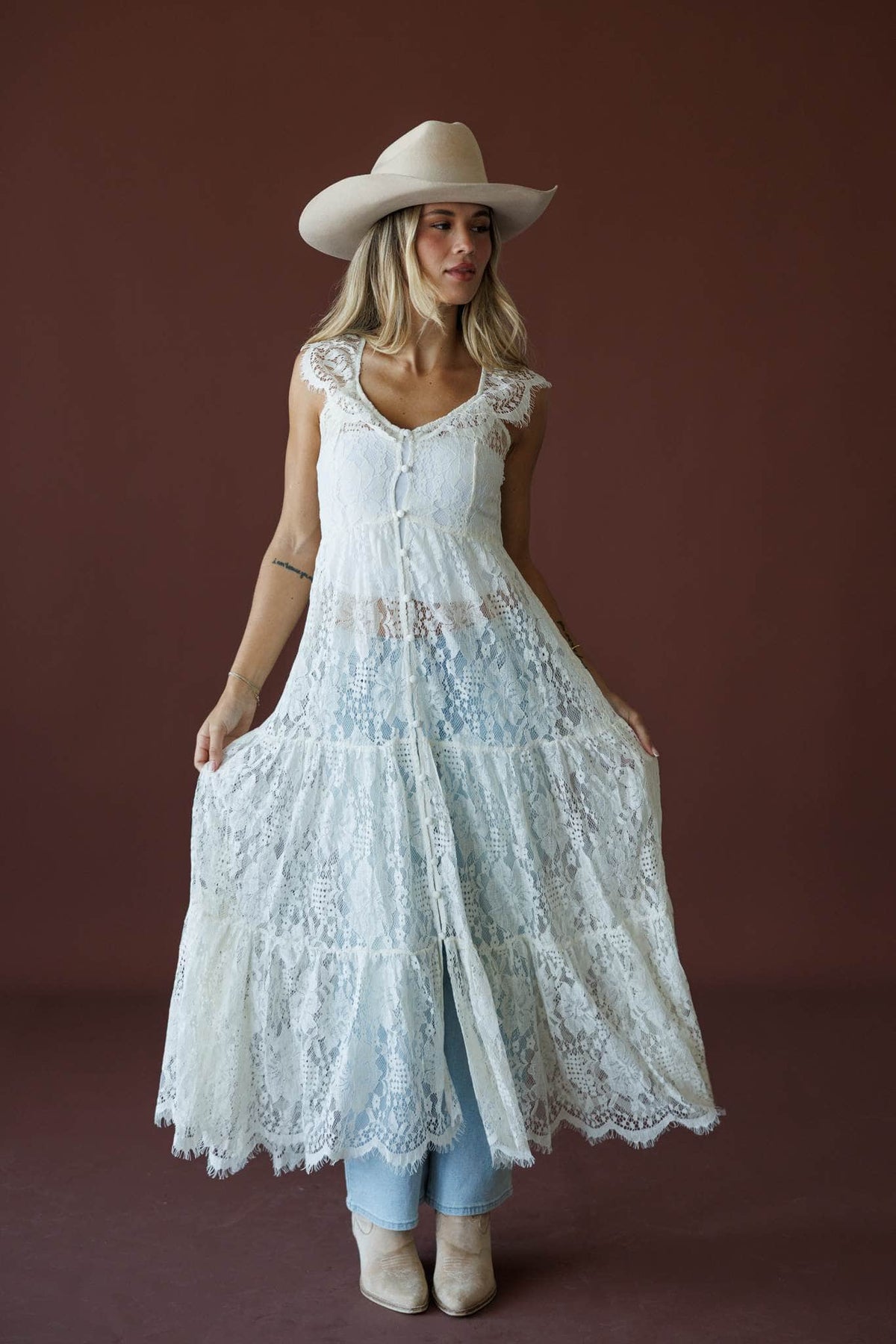 Lace Trail Maxi Top in cream, full-length view with a cream hat over jeans