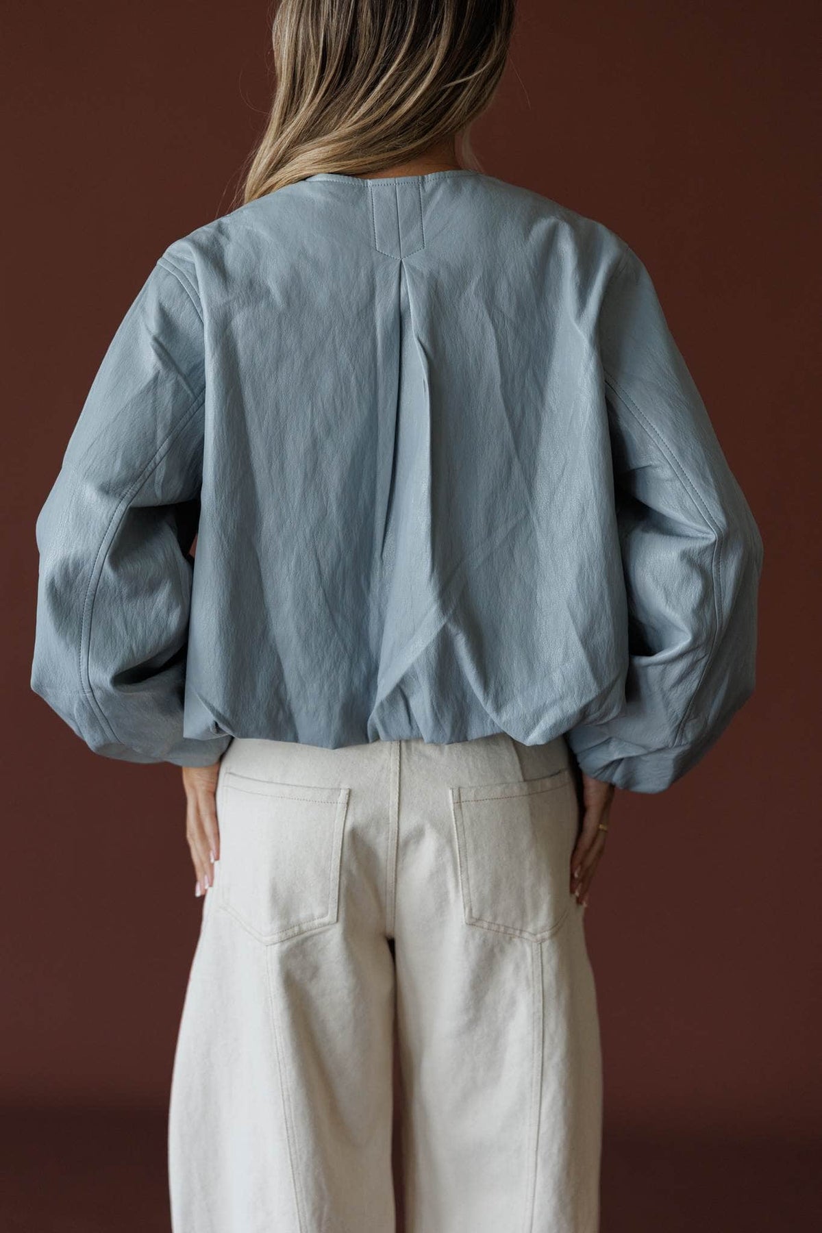 Daily Edition Jacket in fog blue, back view showing the gathered cropped jacket