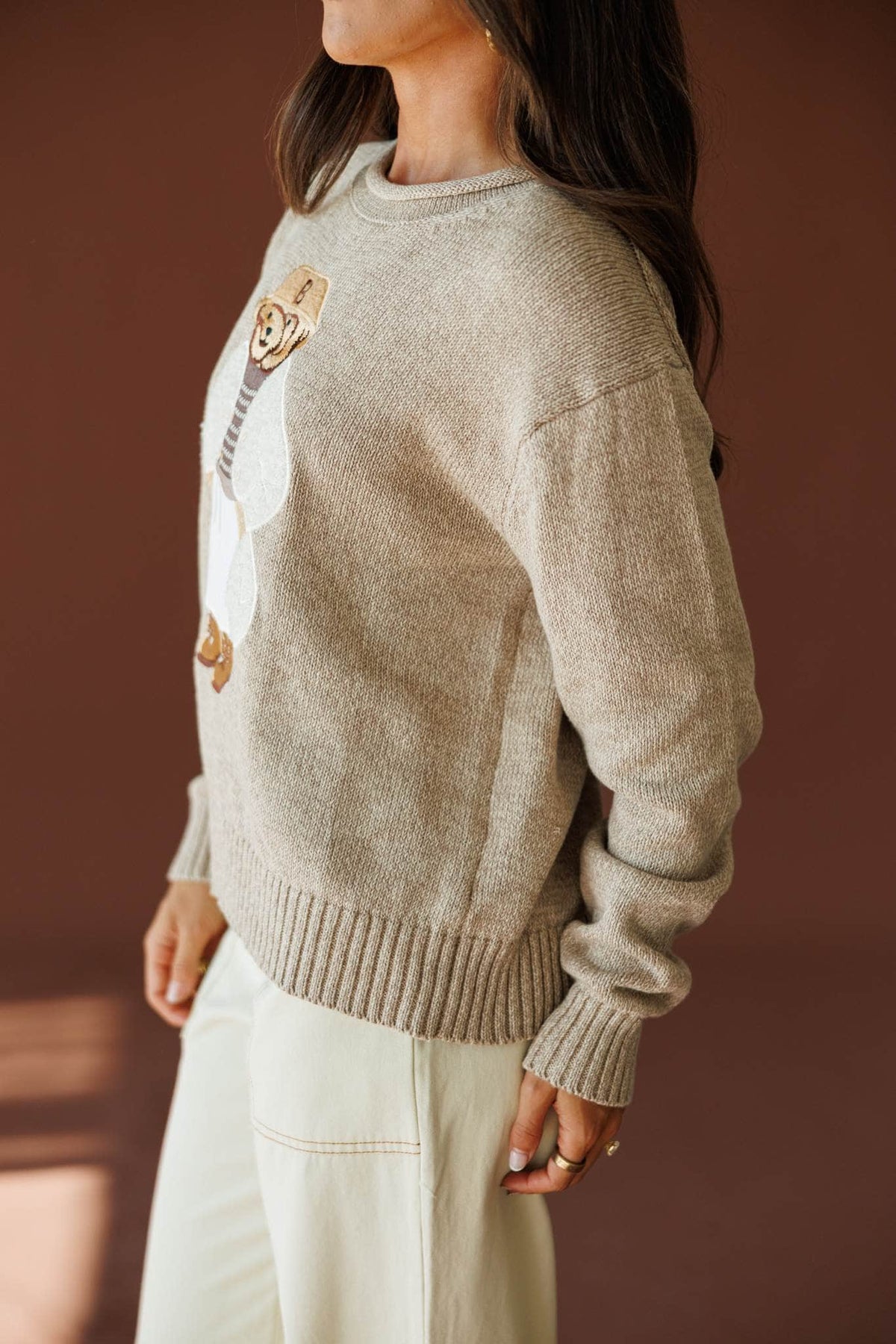 Manhattan Teddy Sweater in taupe, side view showing the oversized knit sweater