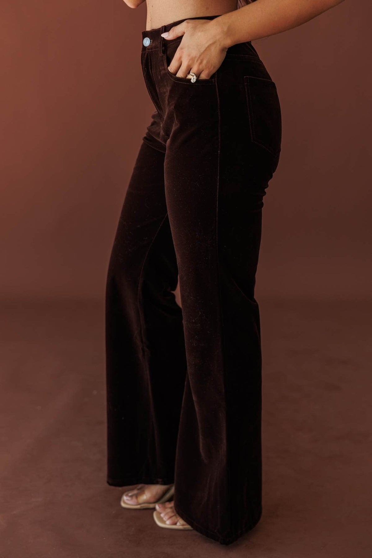 After Dark Velvet Flare Pants, in chocolate, side view of the flared leg
