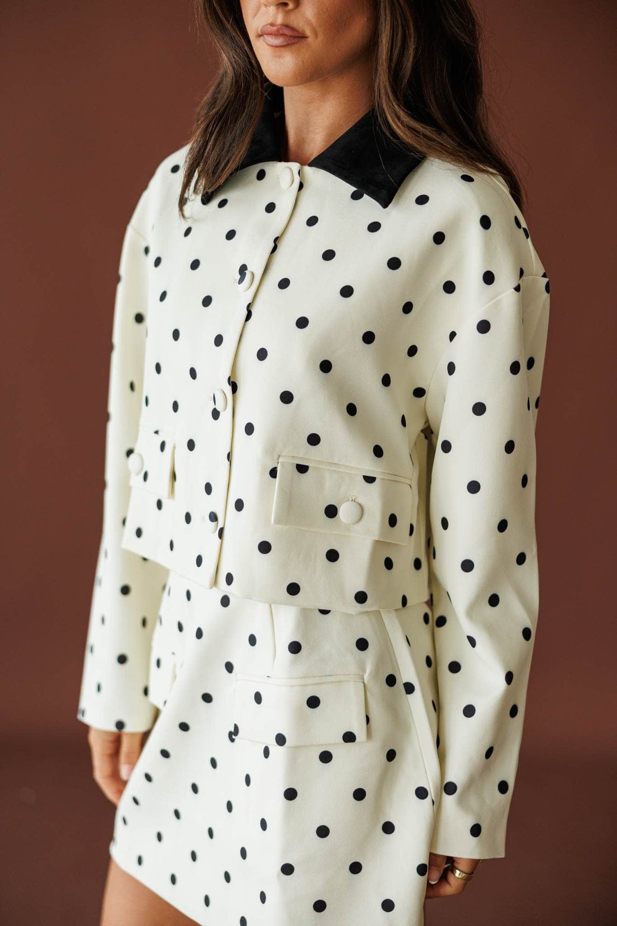 Private Party Jacket in cream black dot, front view of the collar and patch pockets