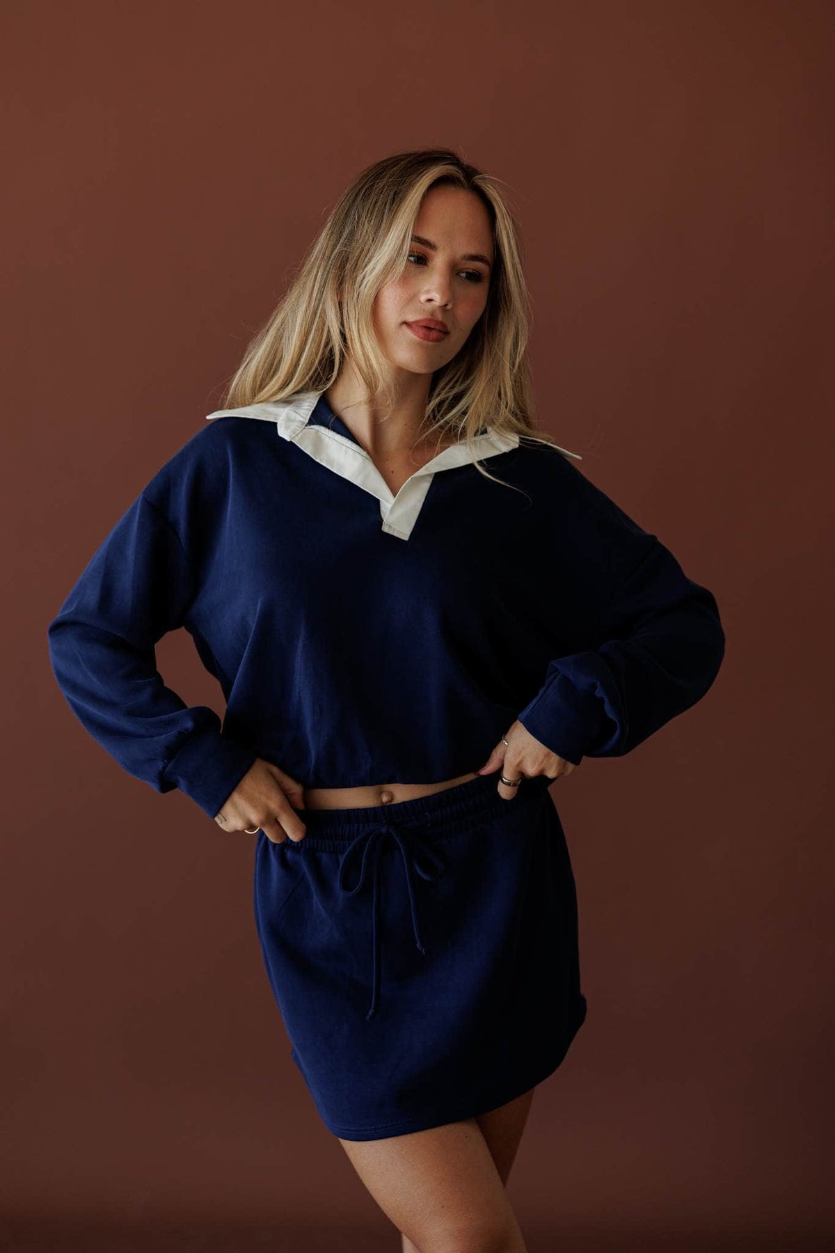 Overtime Scuba Top, in navy, full-length view with the matching skort