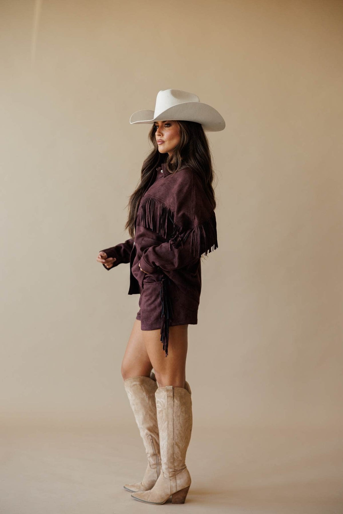Dark brown suede jacket with fringe