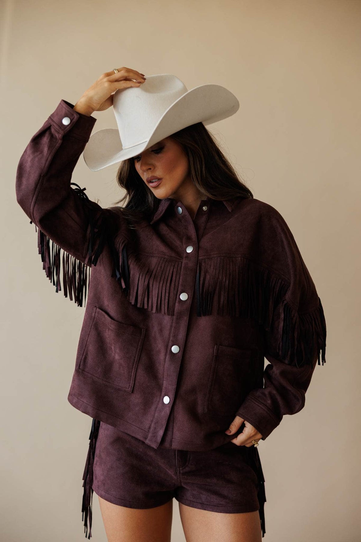 Dark brown suede jacket with fringe
