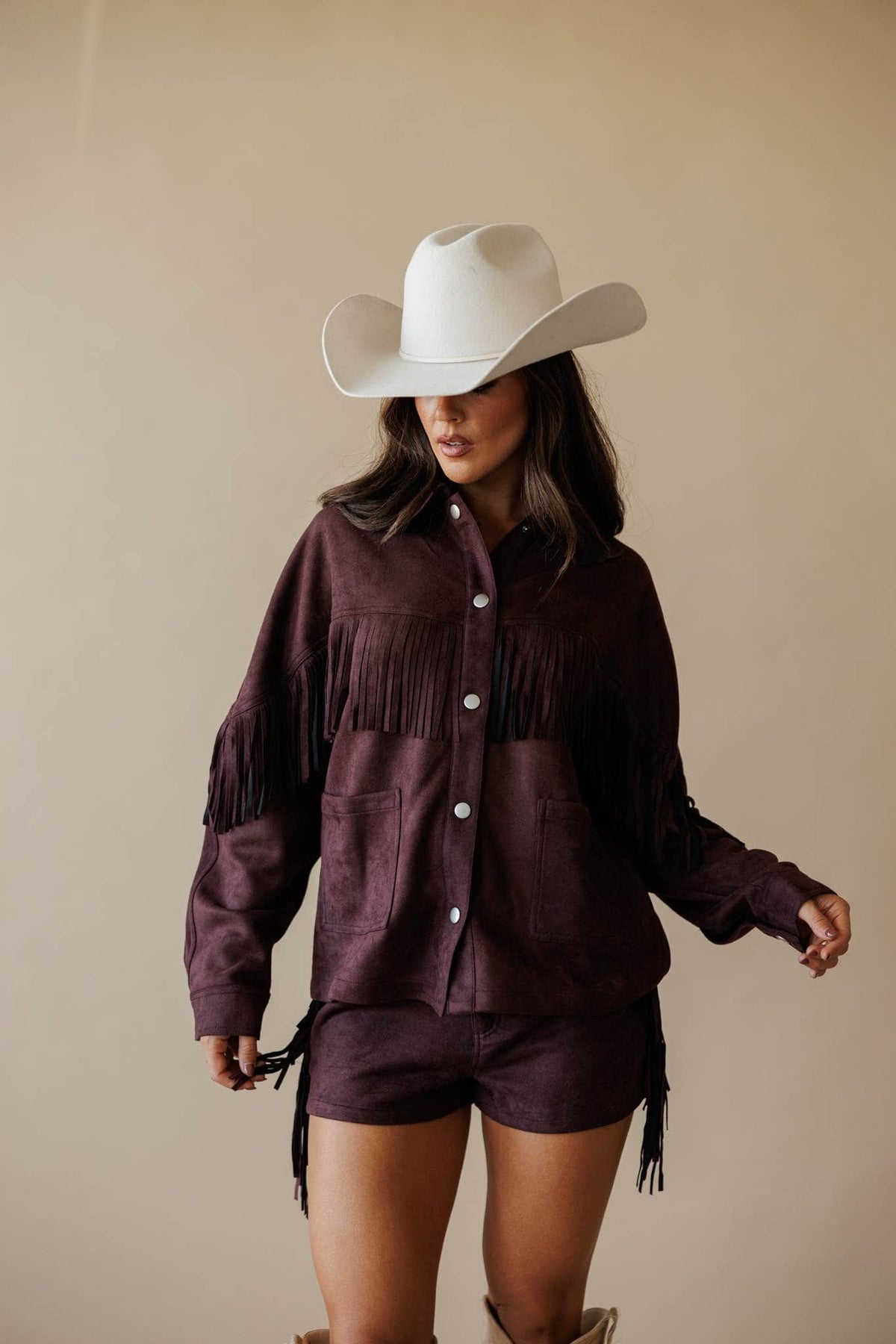 Dark brown suede jacket with fringe