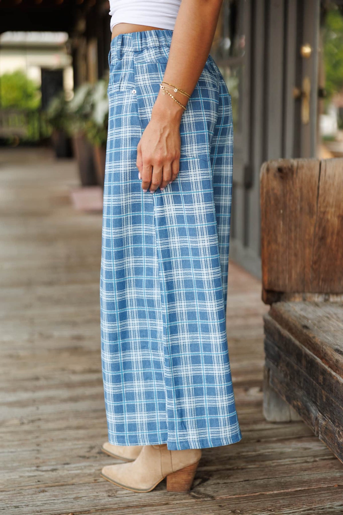Plaid Denim Cropped Wide Leg Pants in denim plaid, side view with hand in the pocket