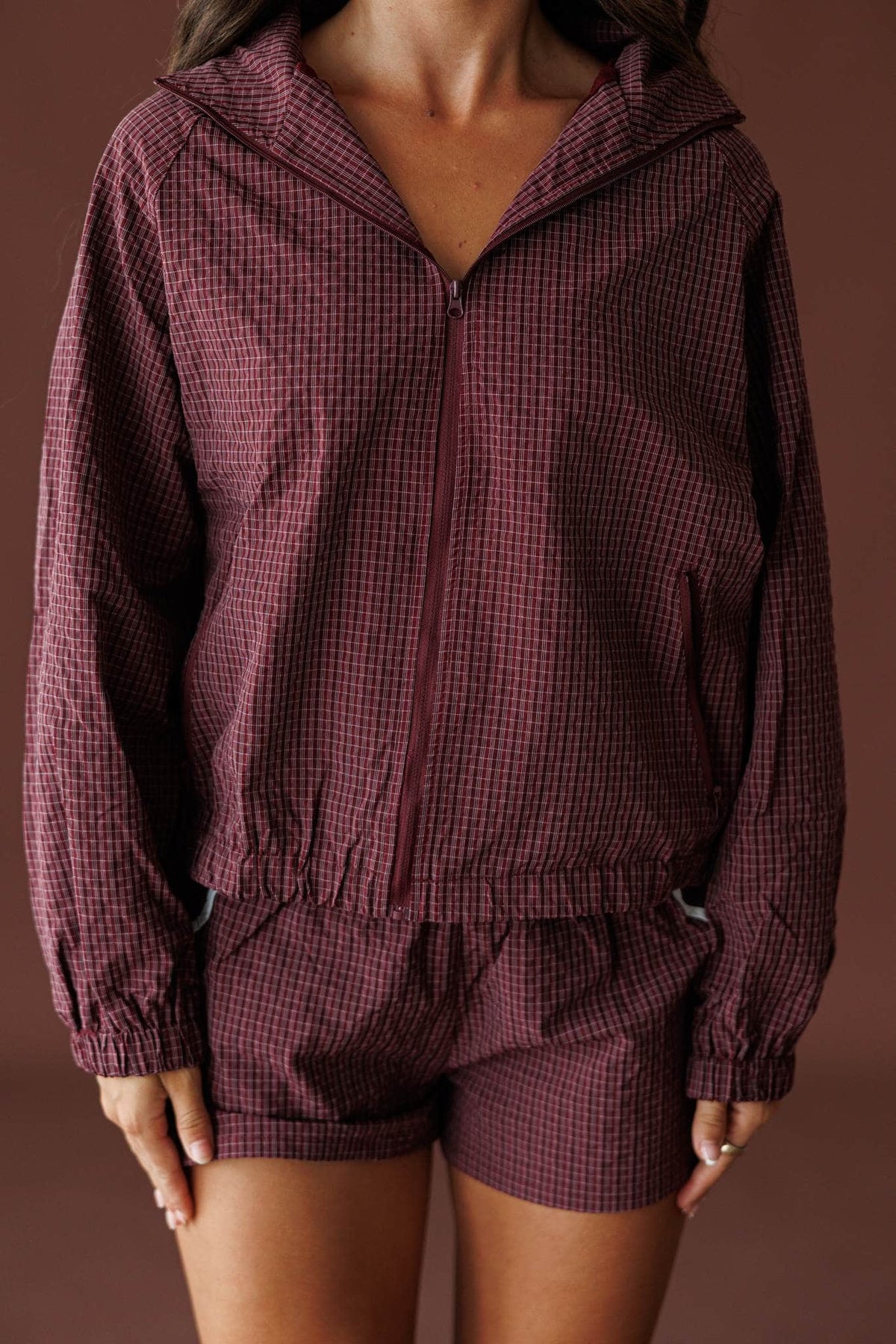 Off Duty Hooded Jacket in burgundy, back close-up of the waffle nylon and hood