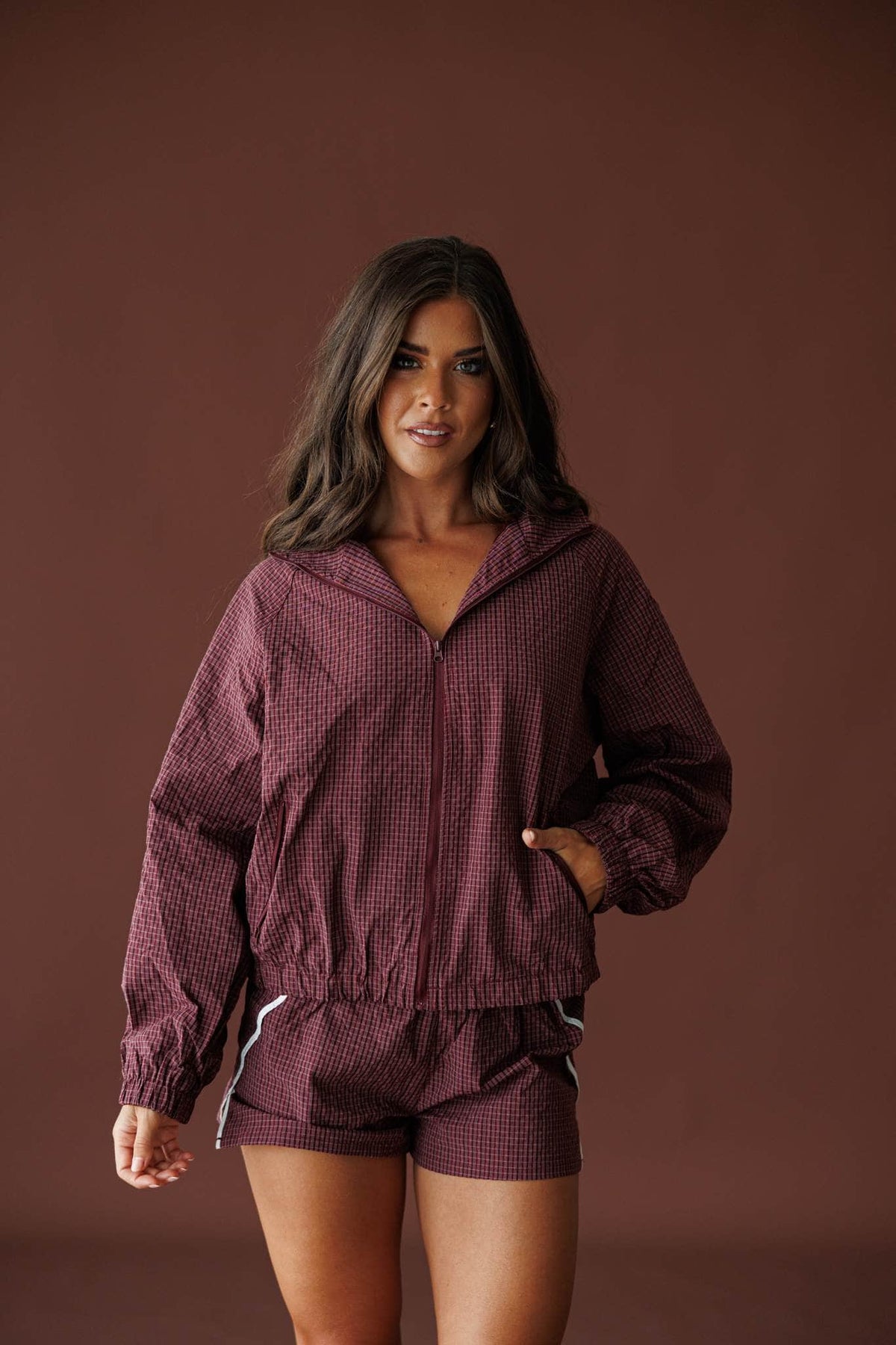 Off Duty Hooded Jacket in burgundy, front view showing the full zip hooded jacket
