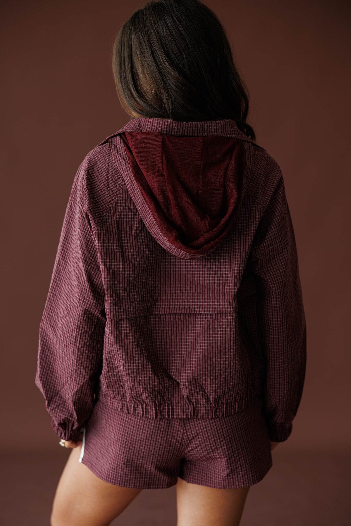 Off Duty Hooded Jacket in burgundy, back view showing the hood and waffle nylon