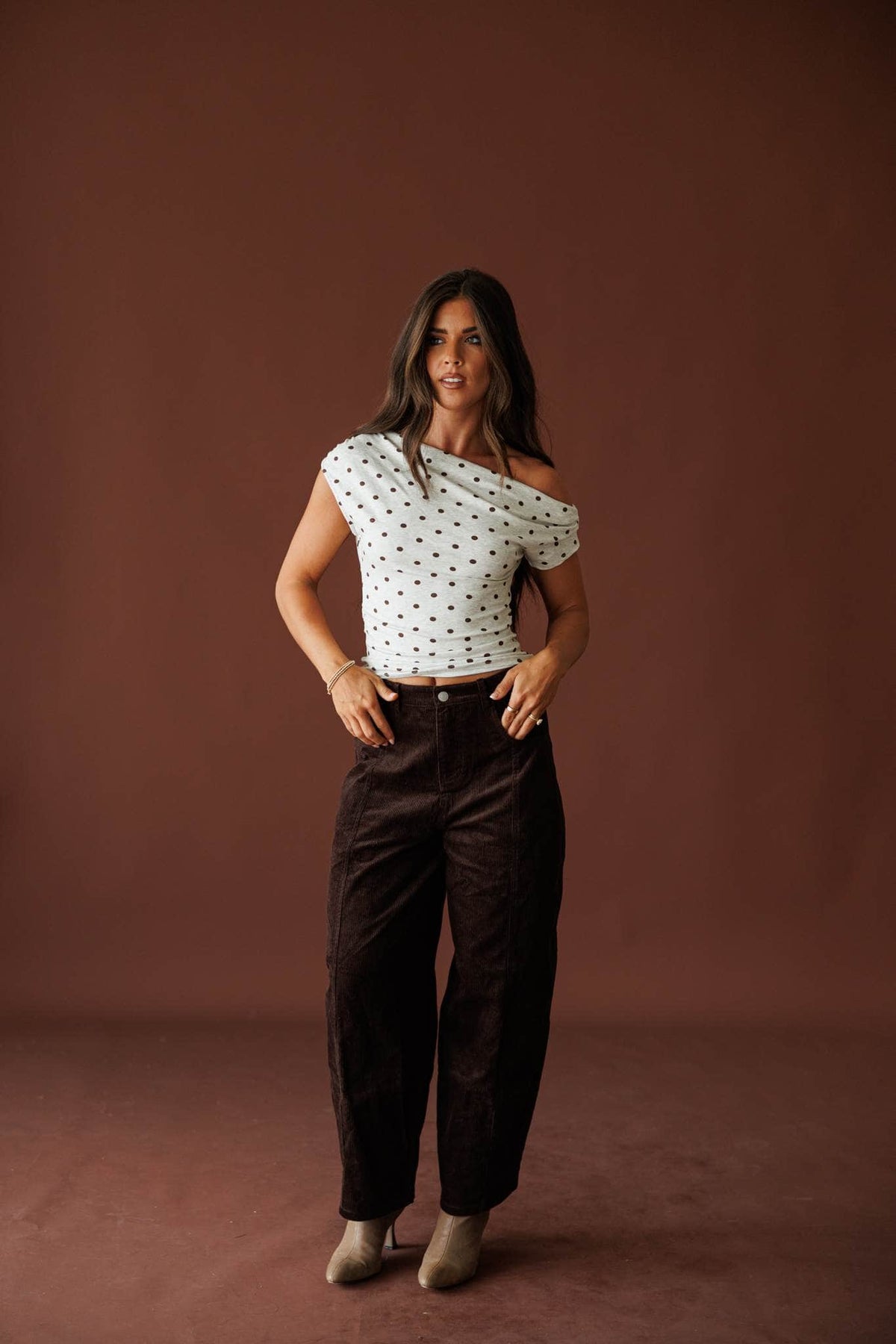 Dot After Dark Top in heather grey and brown dot, front view styled with brown corduroy pants
