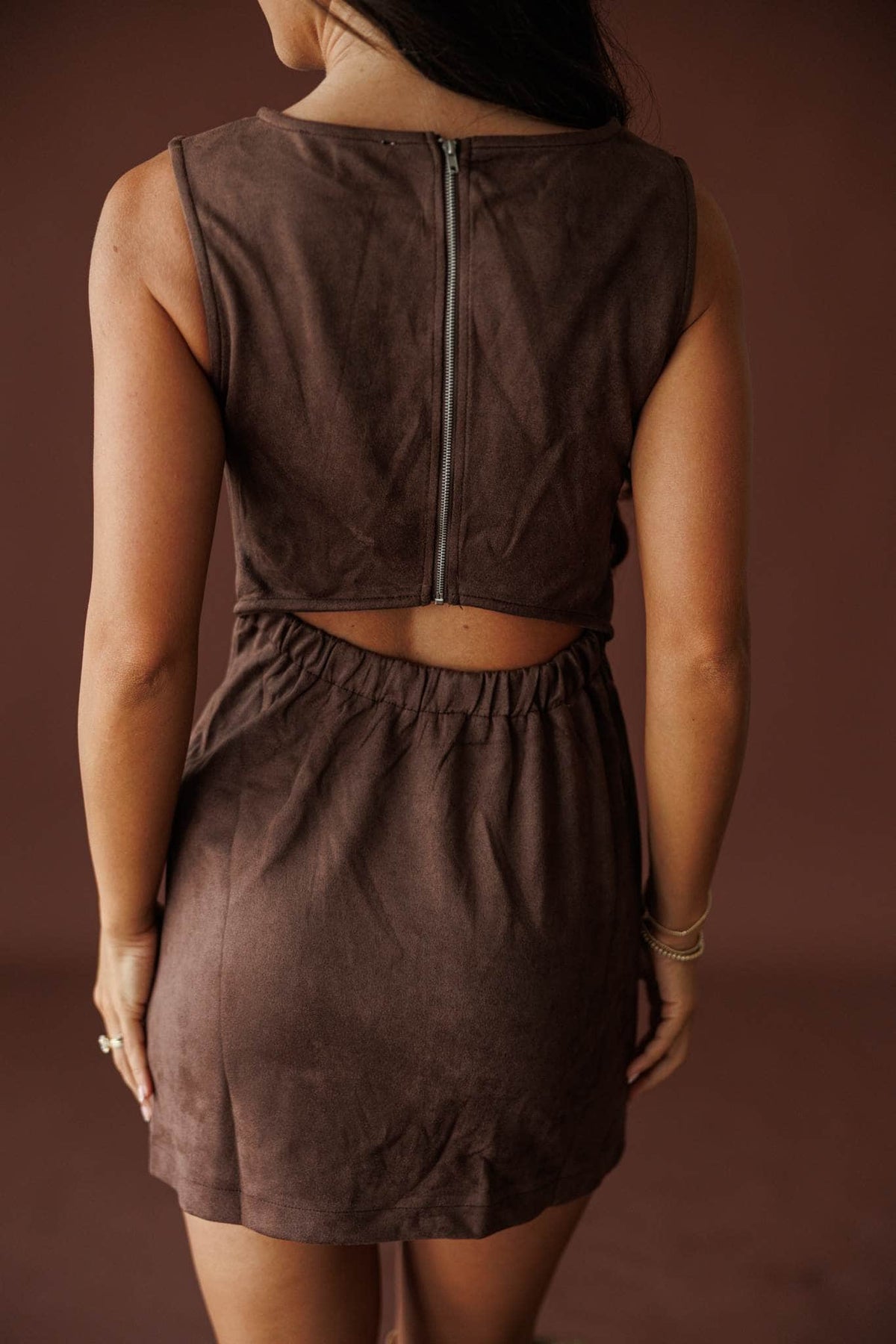 Saddle Up Suede Mini Dress in chocolate, back view showing the open back and exposed zip