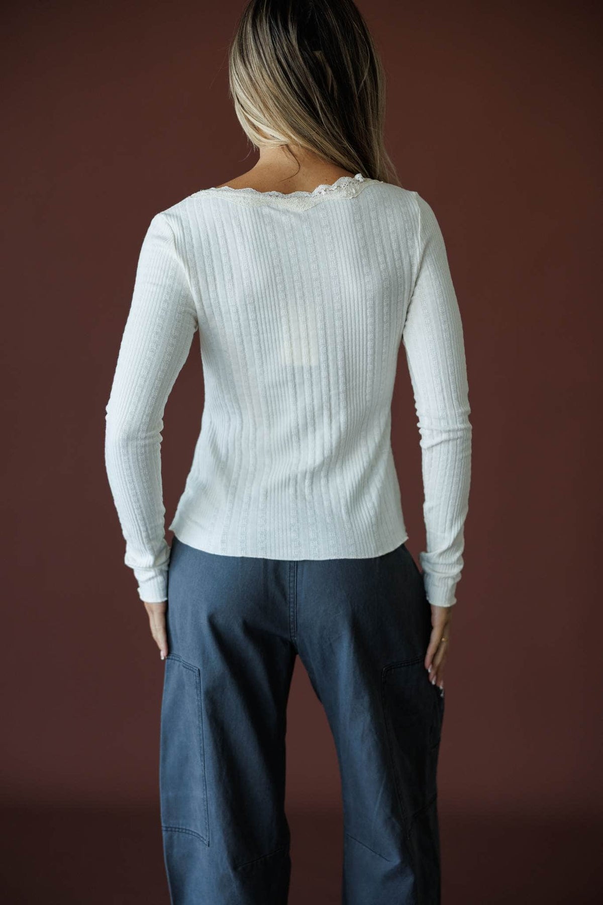 Reminisce Lace Top in cream, back view showing the fitted ribbed knit