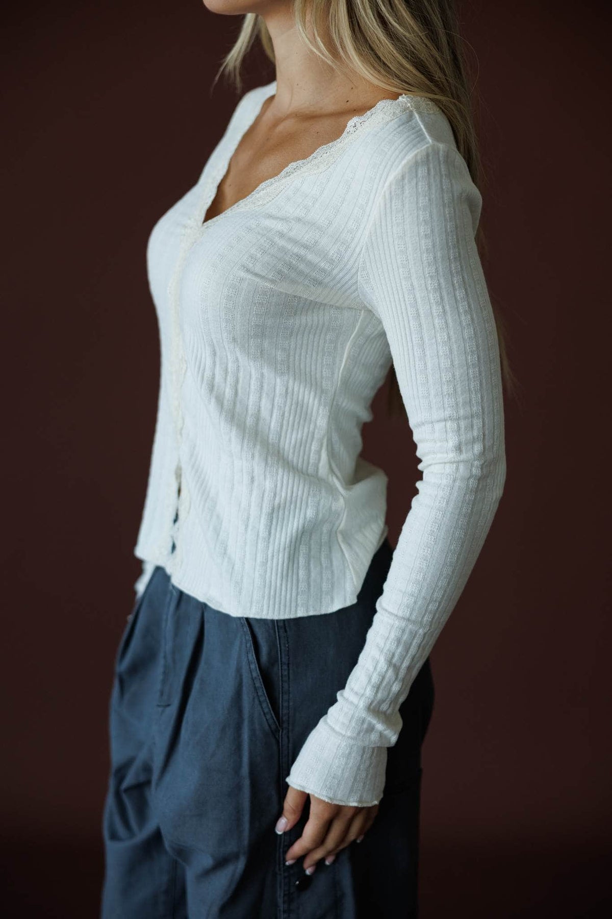 Reminisce Lace Top in cream, side view showing the fitted ribbed knit