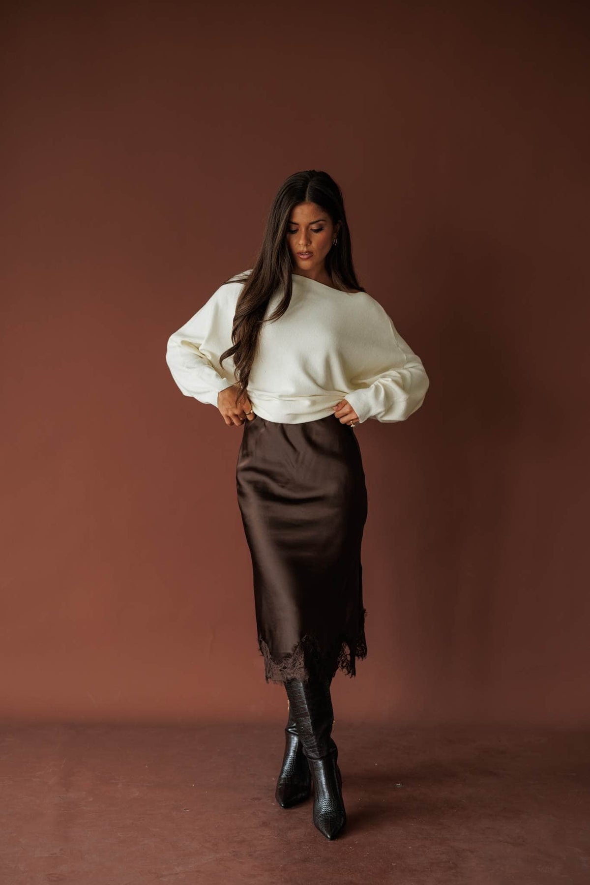 Satin Secrets Lace Midi Skirt, in dark chocolate, full-length front view with a cream sweater