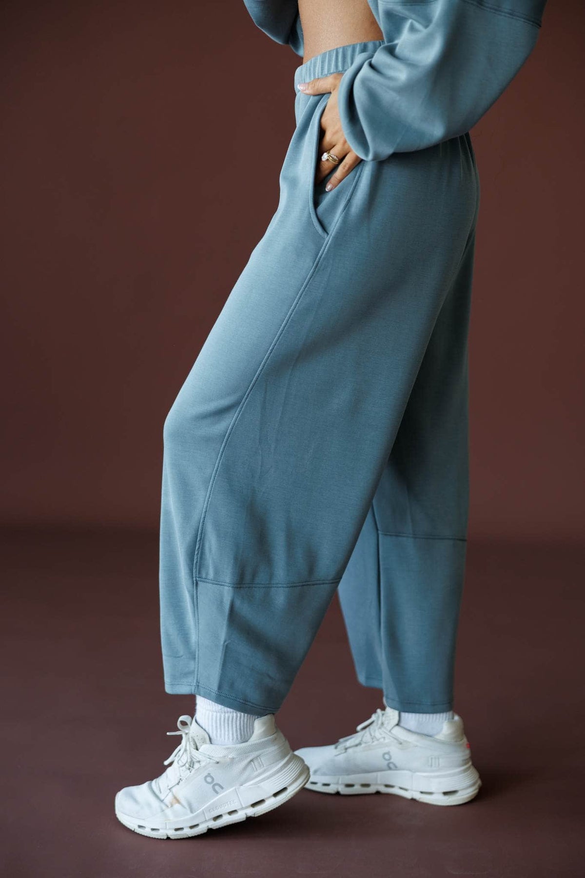 Scuba Barrel Sweatpants in charcoal, side view close-up worn with sneakers