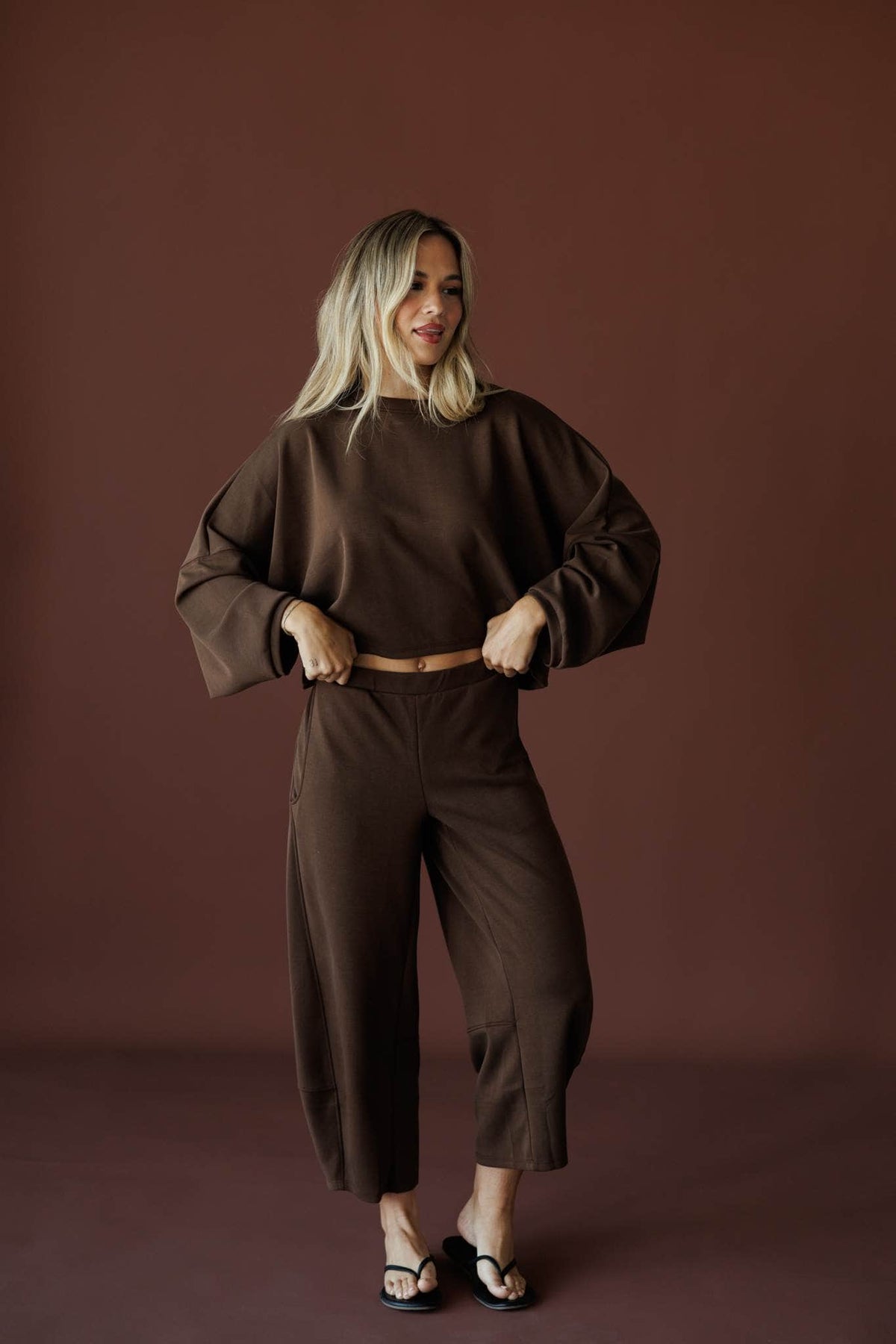 Scuba Barrel Sweatpants in brown, full-length front view on model with matching sweatshirt