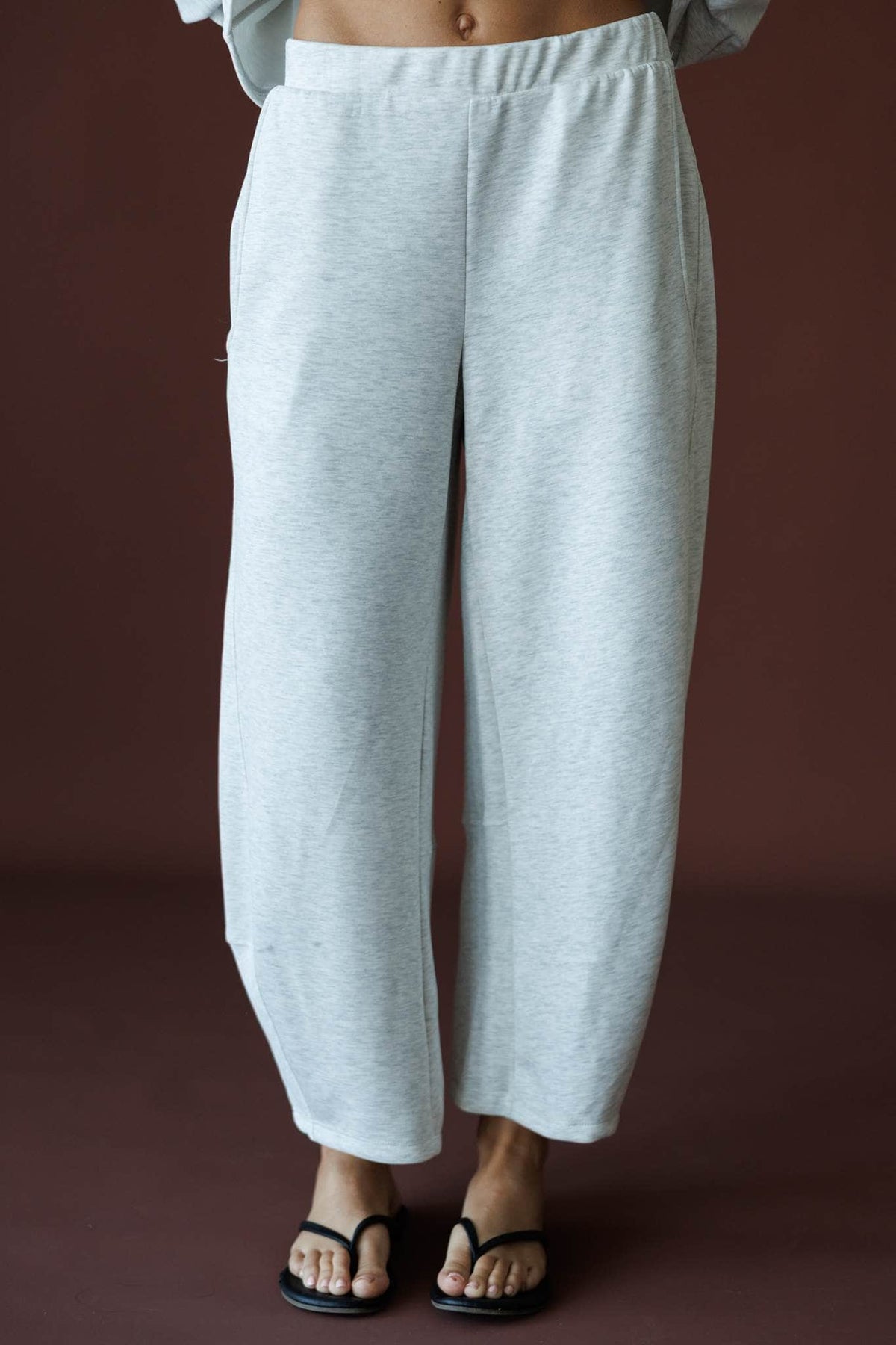 Scuba Barrel Sweatpants in ash grey, front close-up of the elastic waist and barrel leg