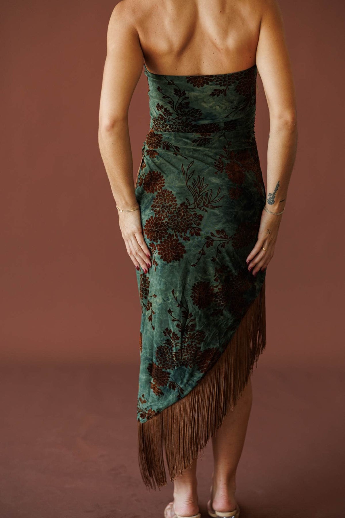 Shimmy All Night Dress in green floral, back view showing the straight back and fringe