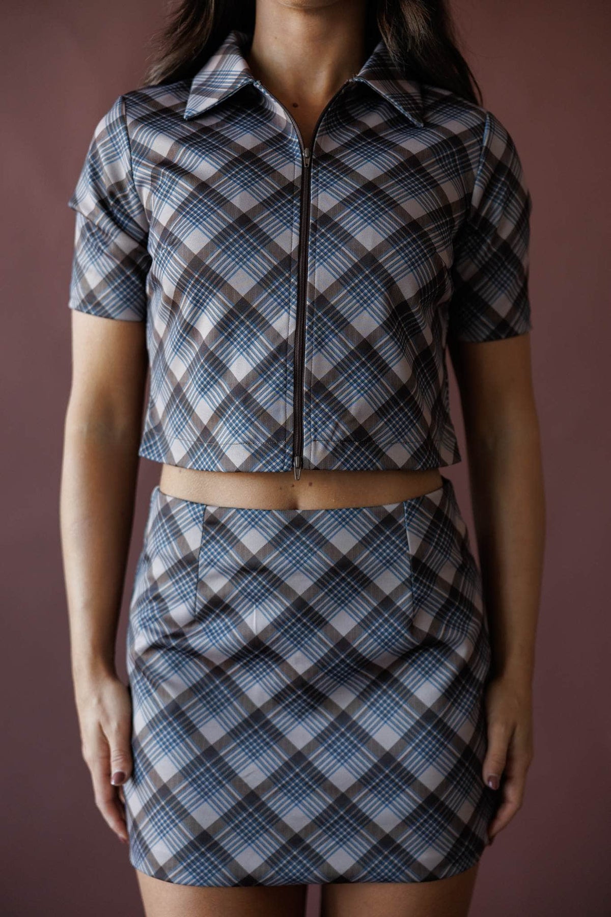 Grey and blue plaid zip front top