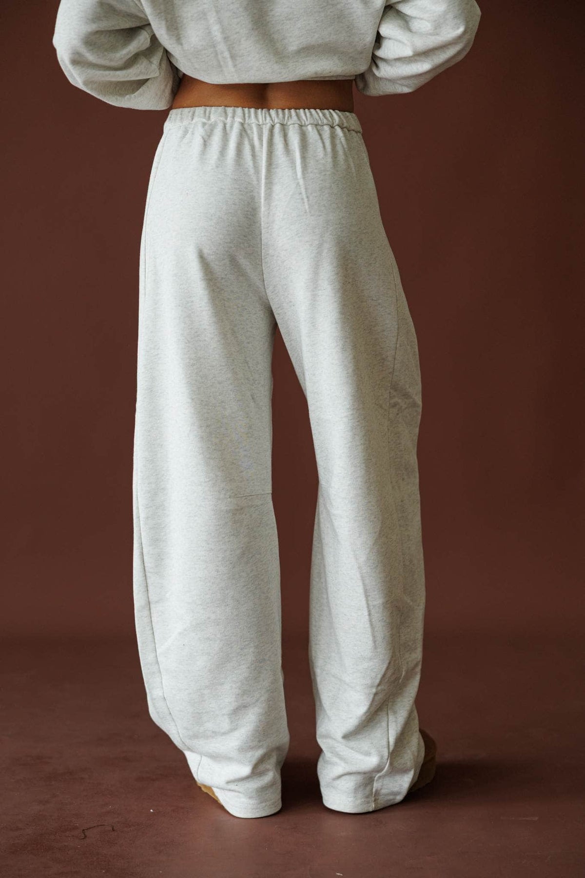Slow Sunday Terry Pants in heather grey, back view showing the gathered cuff terry pants