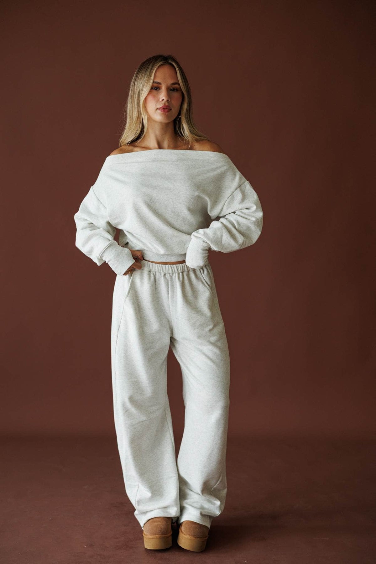 Slow Sunday Terry Top in heather grey, front view on model with hands at the sides