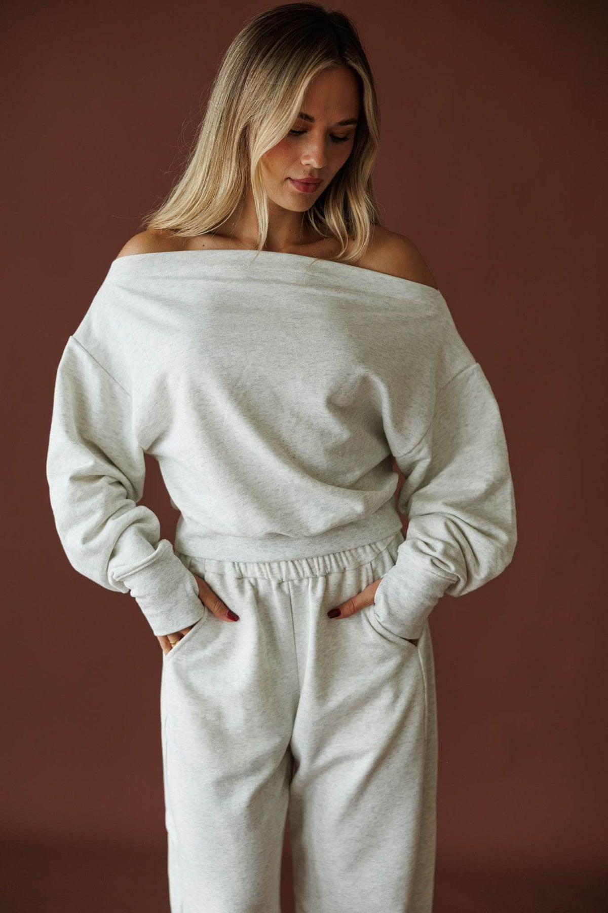 Slow Sunday Terry Top in heather grey, front view showing the off shoulder terry sweatshirt