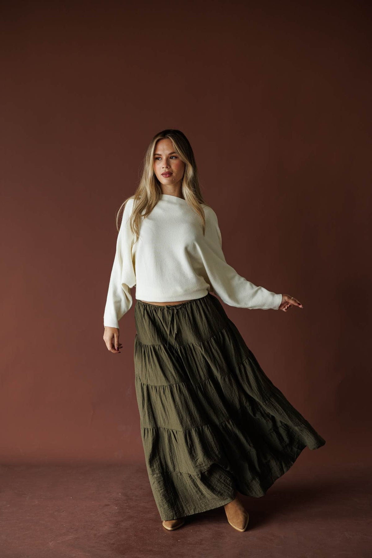 Cream boat neck knit top with blouson sleeves