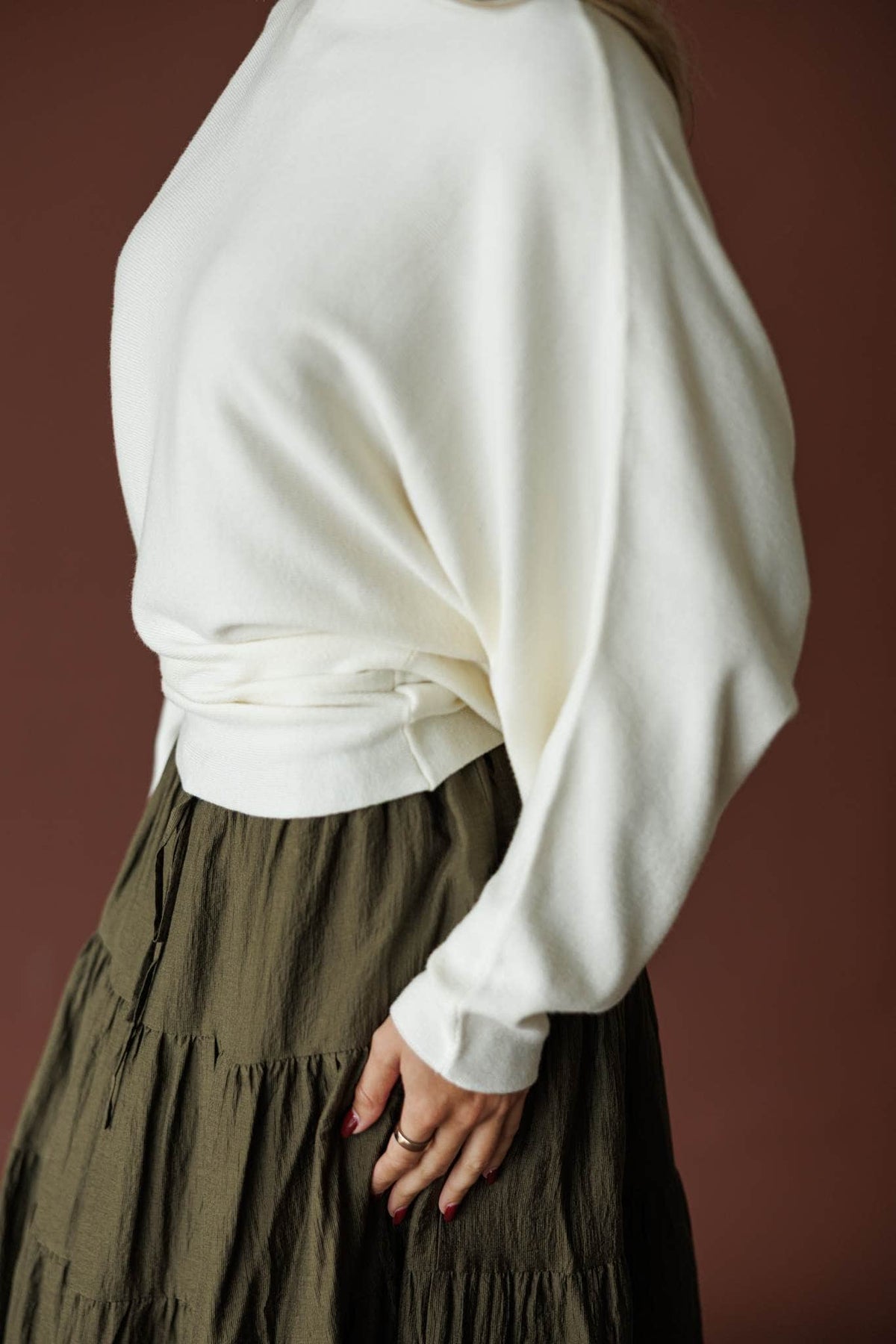 Cream boat neck knit top with blouson sleeves