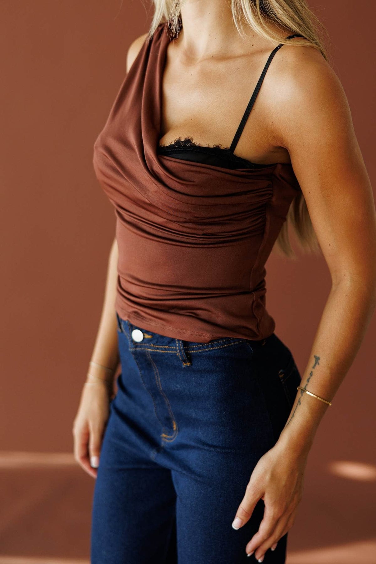 Street Stories Top in brown, side close-up of the ruched mesh and lace trim
