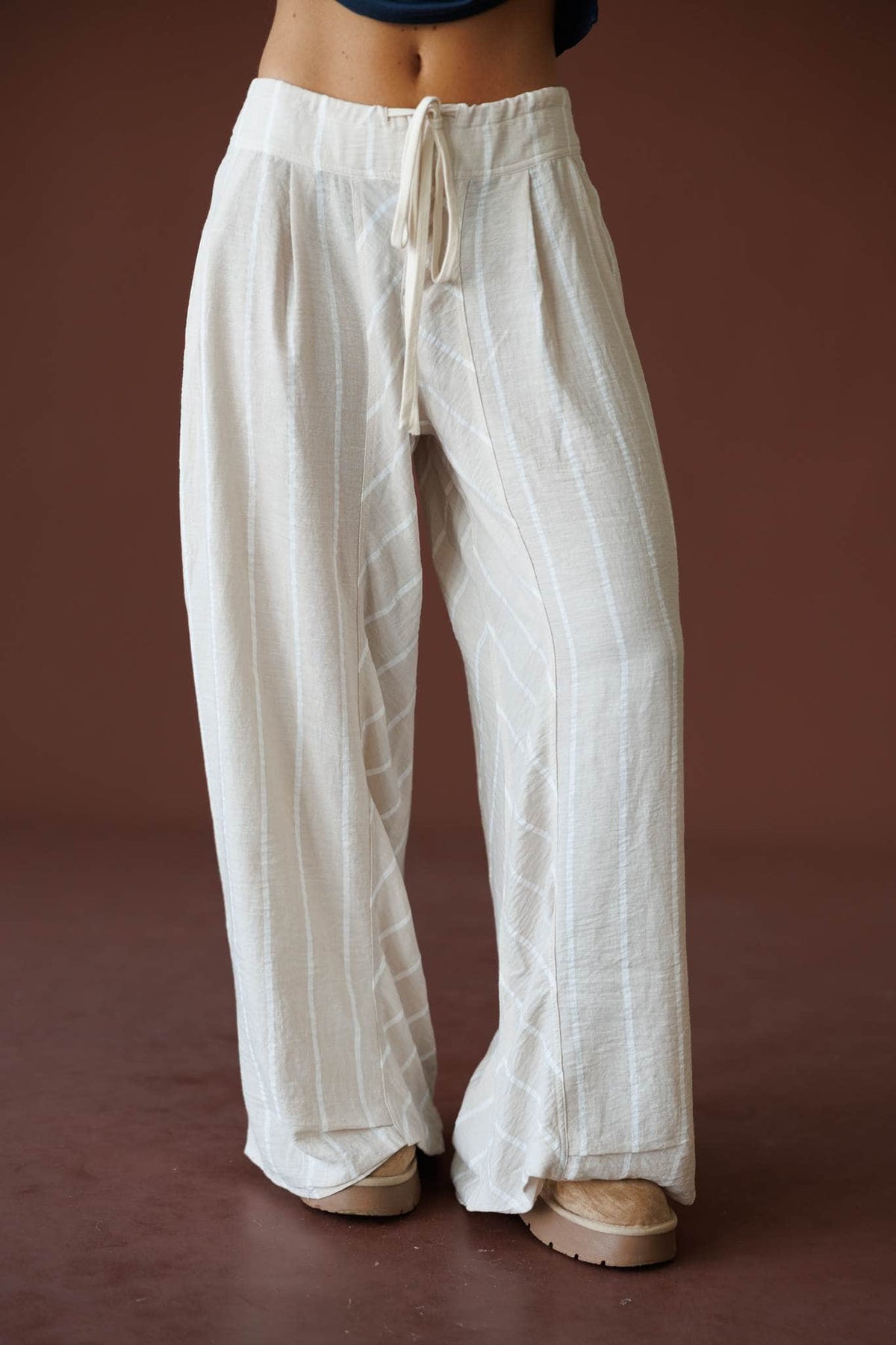 Sunroom Linen Wide Leg Pant in taupe, front close-up of the drawstring waist and wide leg