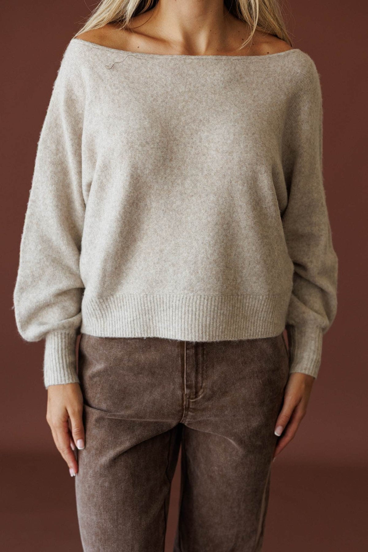 Slightly Undone Sweater in oatmeal, front close-up of the wide boat neck