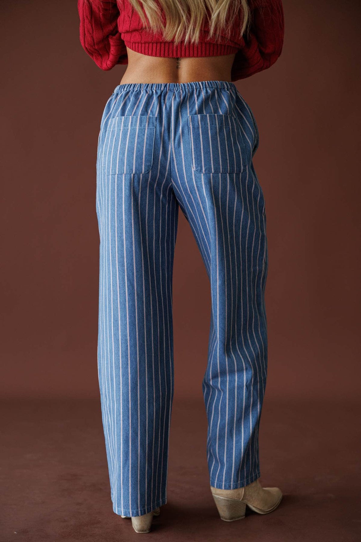 Ticking Stripe Denim Pants in washed blue, back view showing the wide leg striped denim