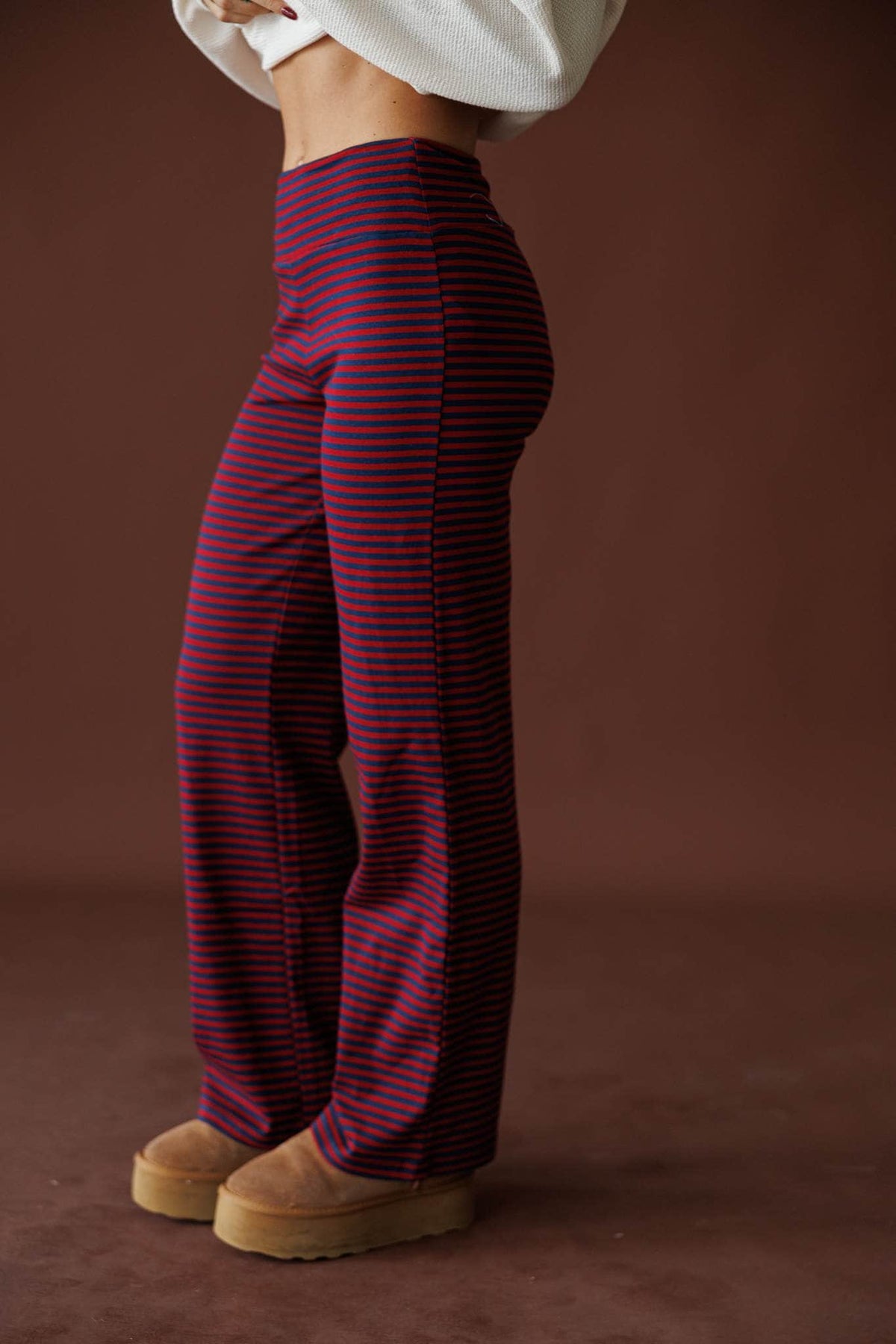 Everyday Stripe Yoga Pants in navy and burgundy, side view showing the striped straight leg