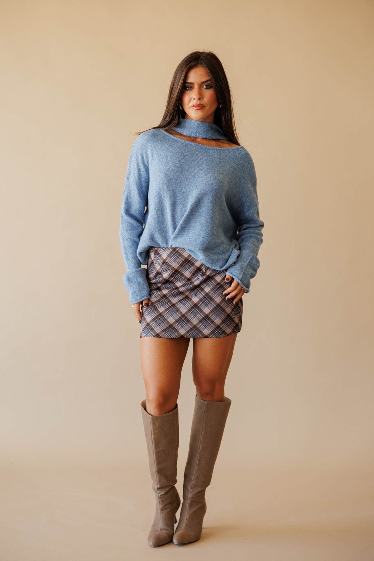 Dusty blue cold shoulder sweater with scarf detail, front view