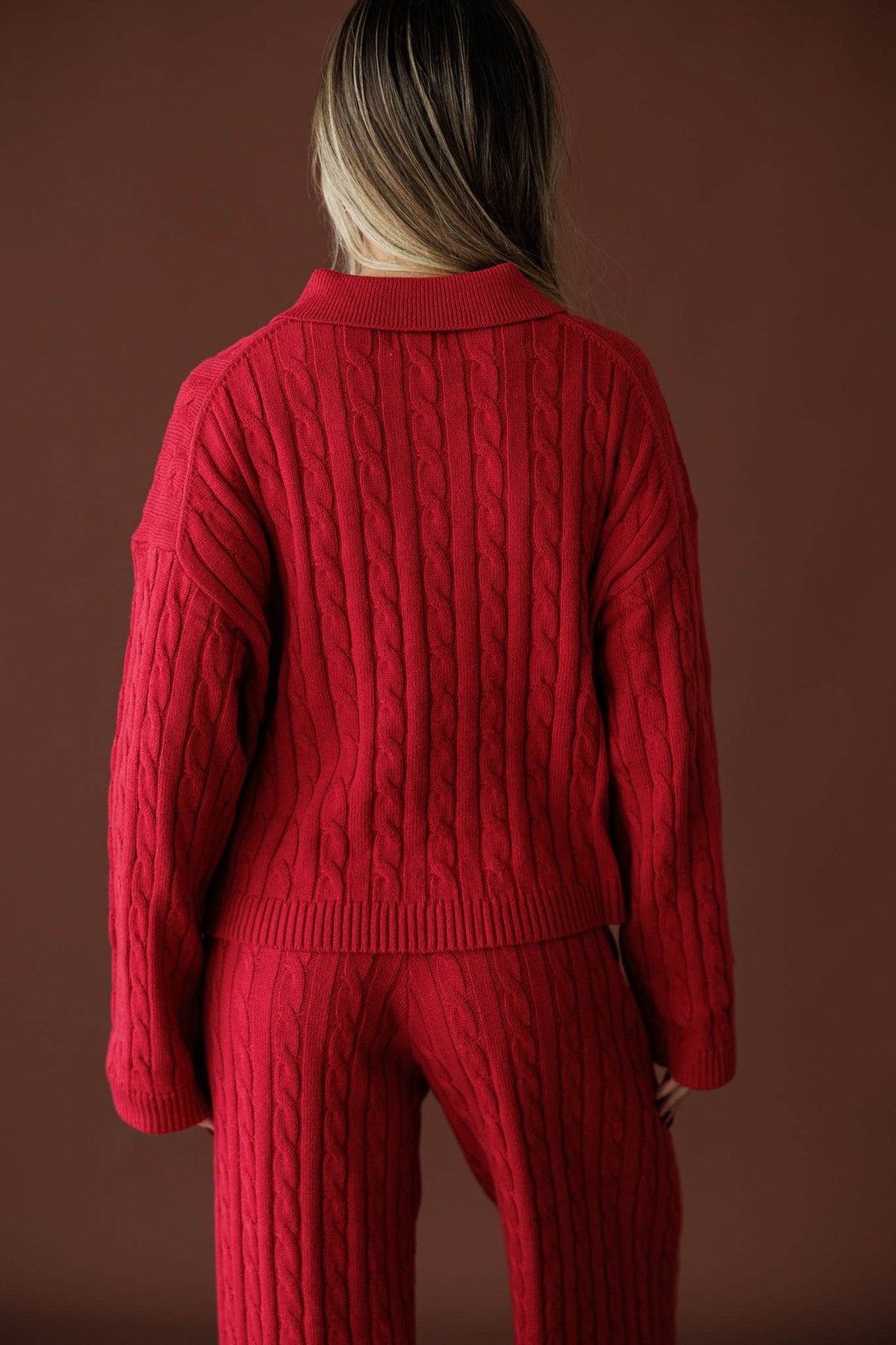 Cherry Cable Knit Sweater in red, back view showing the oversized cable knit sweater