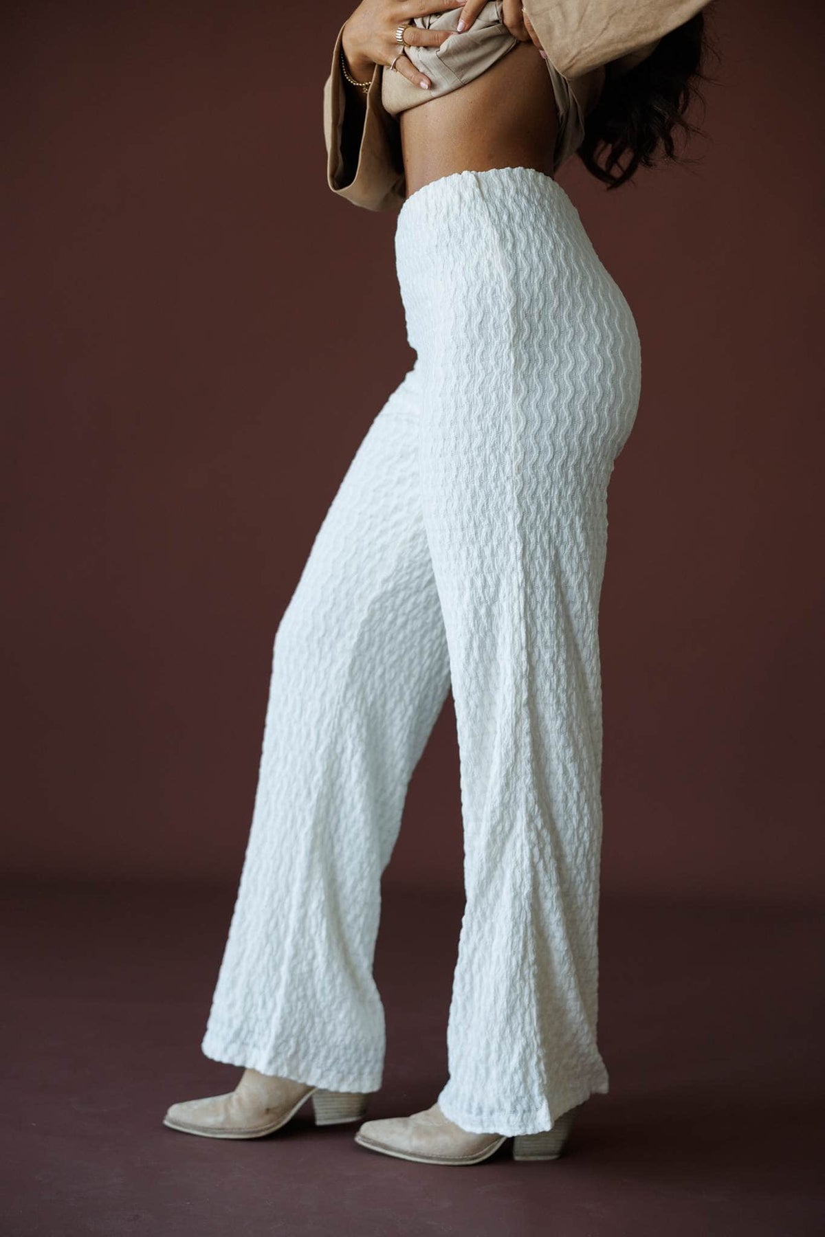 Textured Pull On Pants in ivory, side view showing the textured knit flare