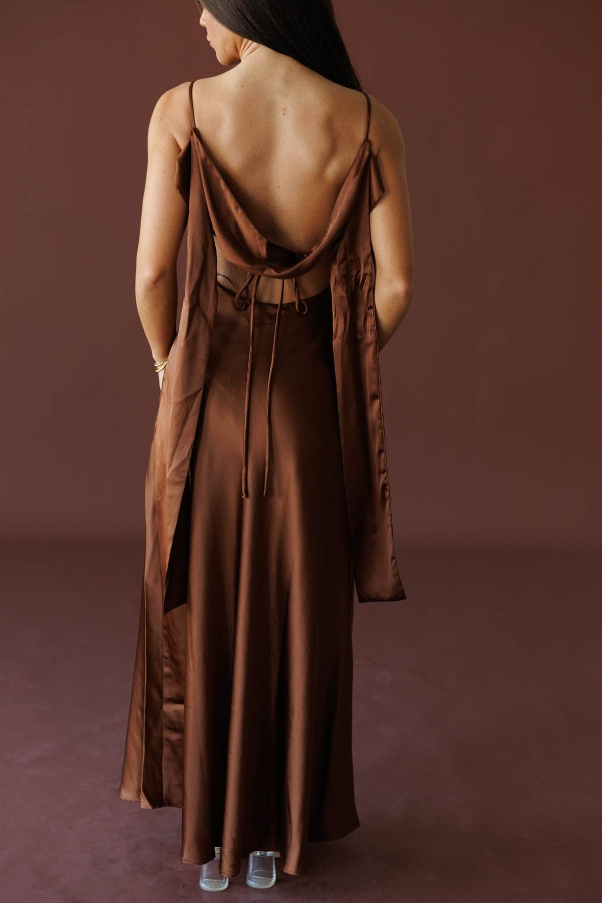 The Candlelight Dress in brown, back view showing the open back and long ties