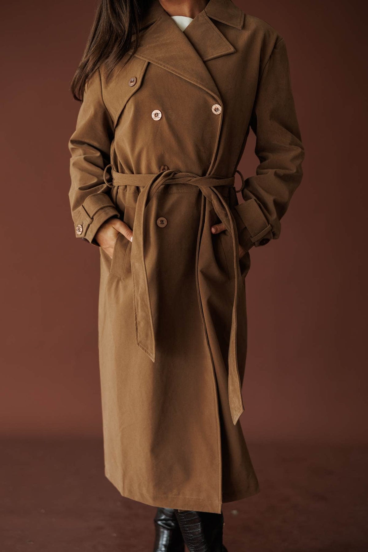 The Estate Walk Trench, in taupe, front view of the double breasted front and tie belt