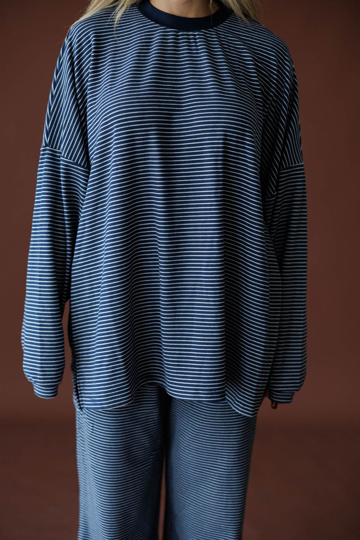 The Social Club Fleece Top in navy, back view showing the oversized ribbed fleece top