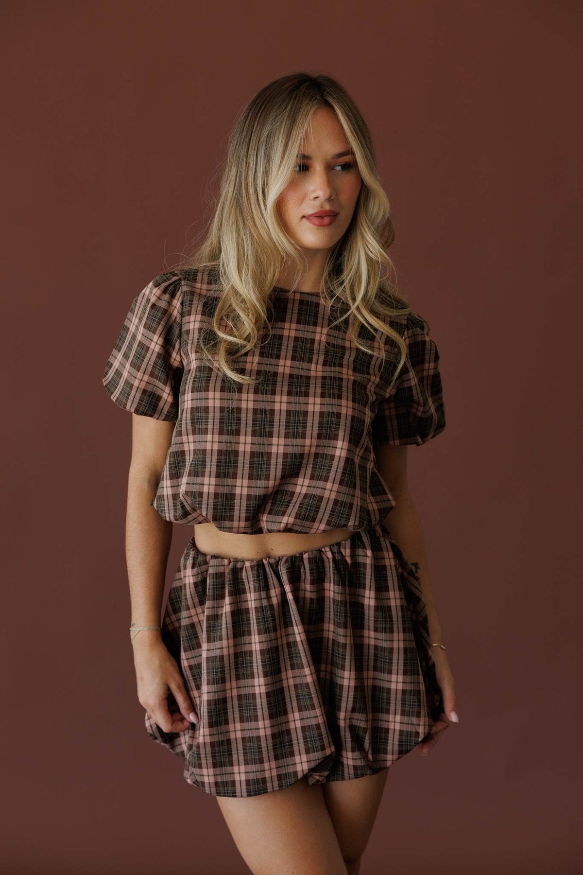 Brown plaid short sleeve top, front view
