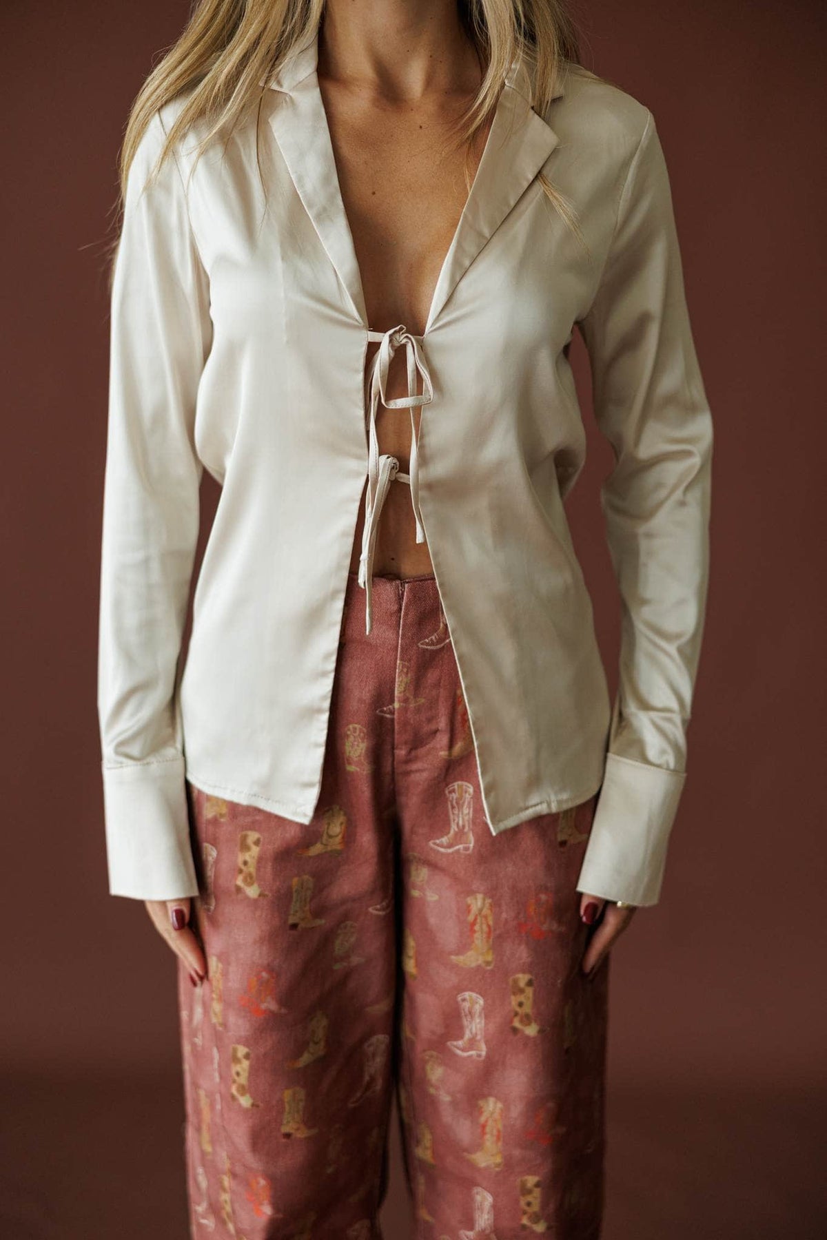Tied To You Satin Blouse in cream, front close-up of the lace up front and collar
