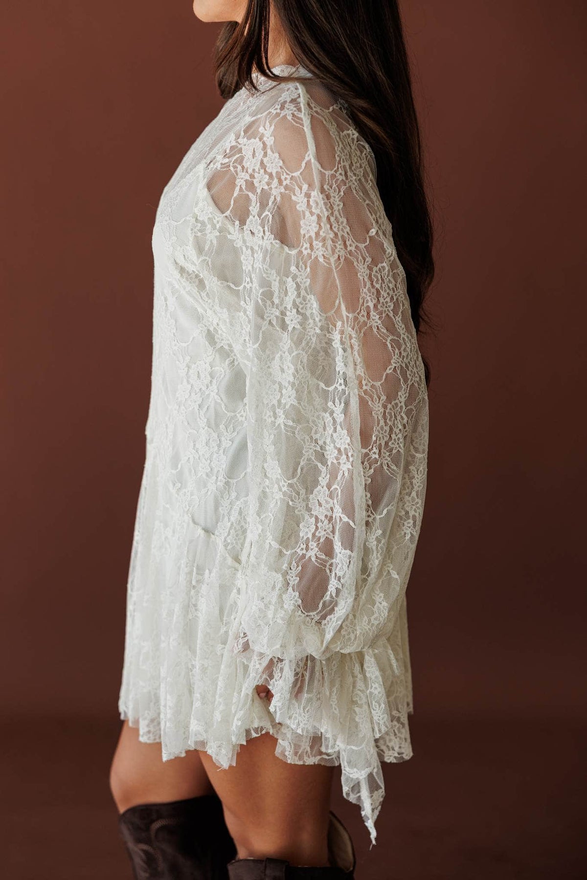 Lace Legend Mini Dress, in cream, side view of the lace hem